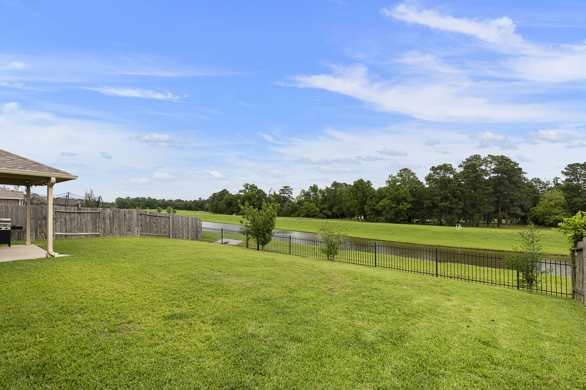 You will never tire of these backyard views or of the privacy provided by this large backyard. All bodies of water are stocked for fishing!
