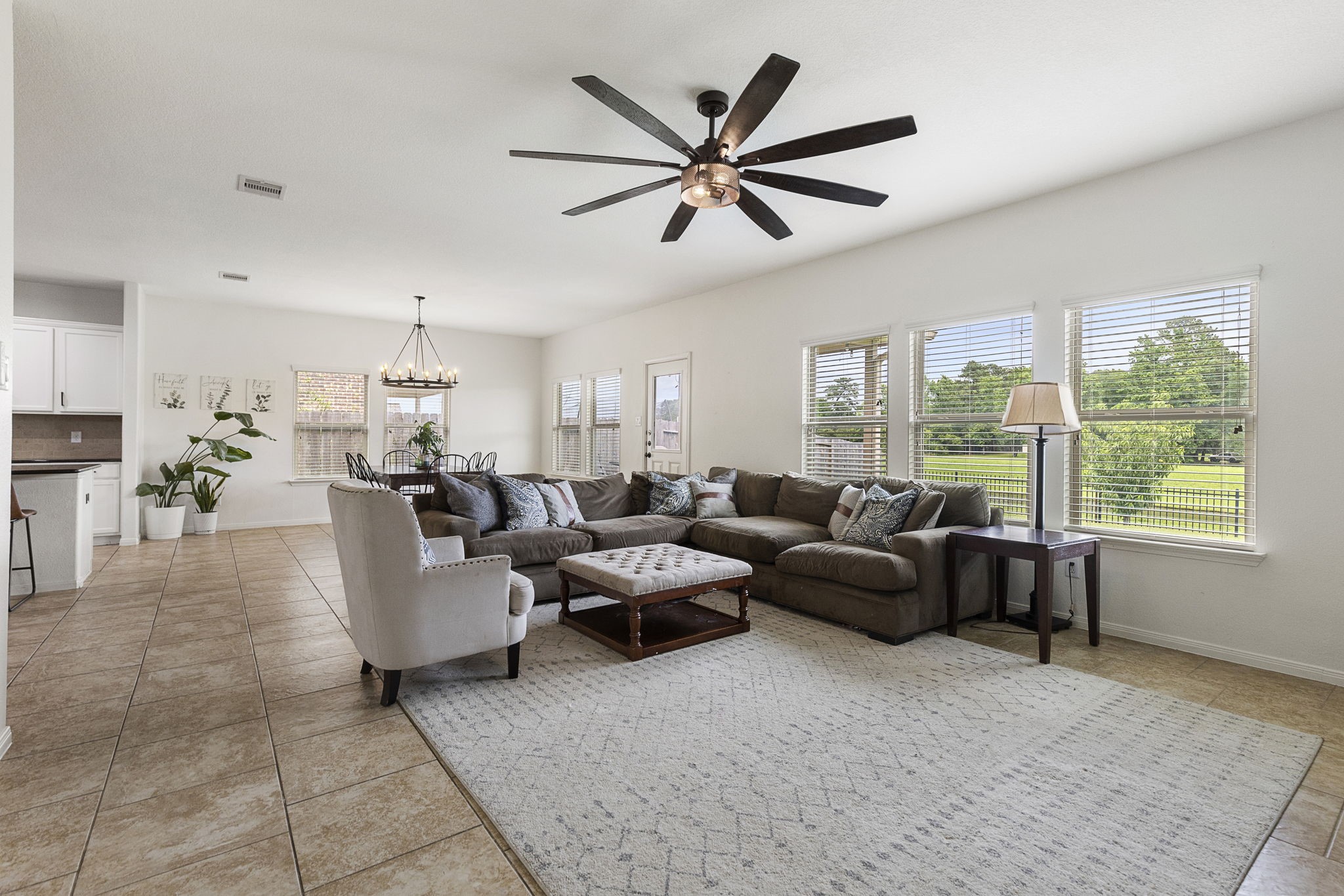 This large den is big enough for your oversized furniture and has the best backyard views.
