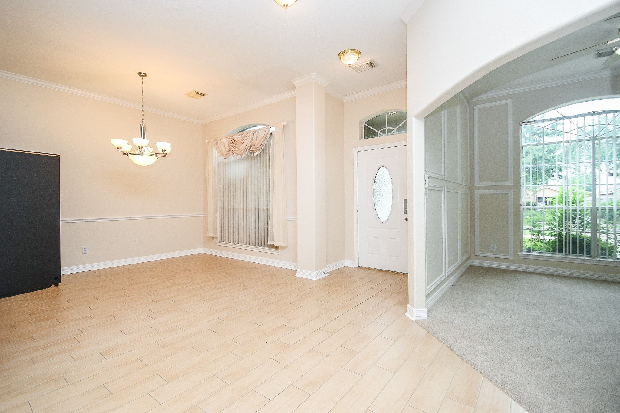 Bright and inviting entryway filled with natural light.