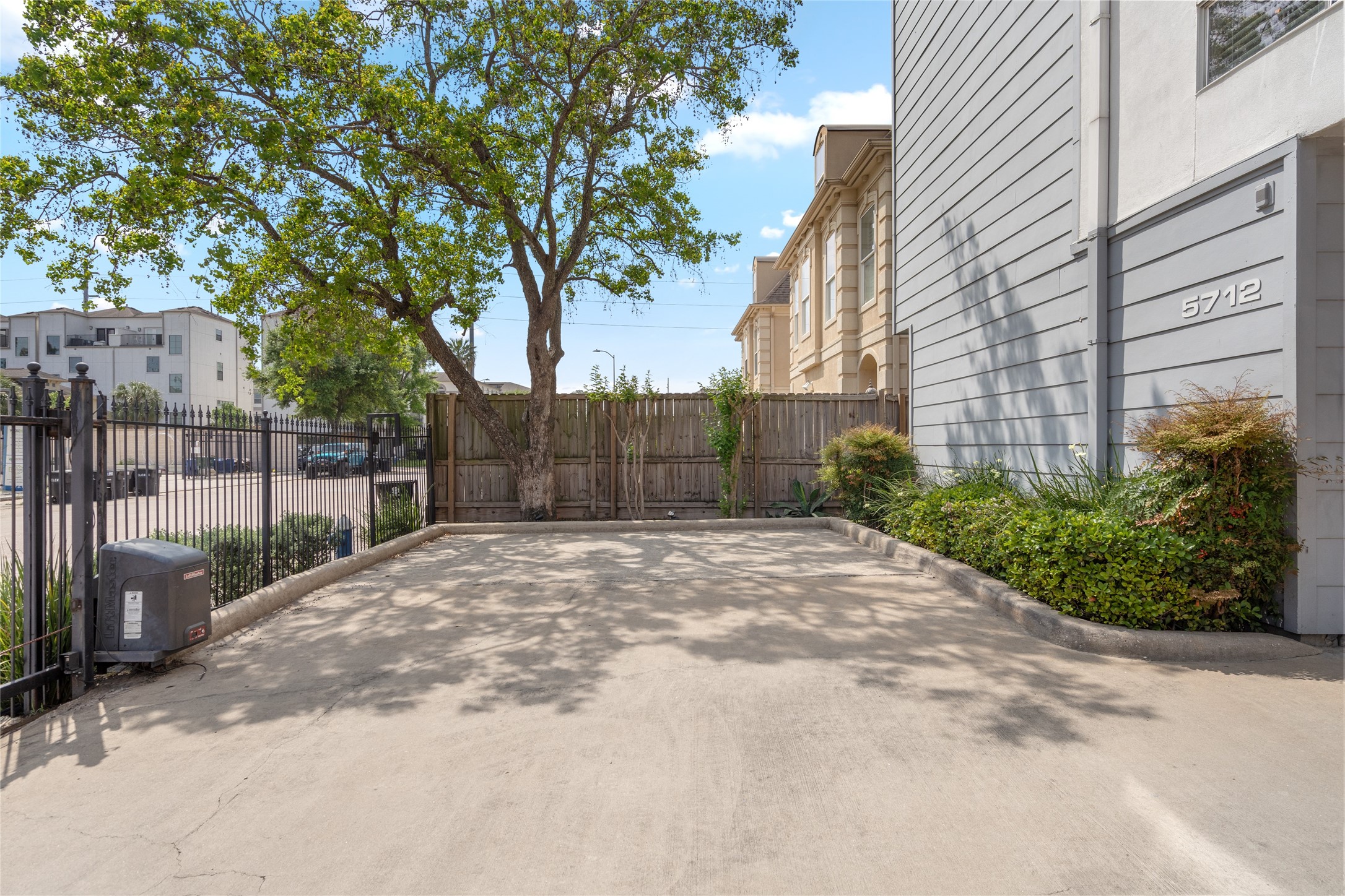 Gated community with secure access, offering privacy and convenience near shopping and dining.