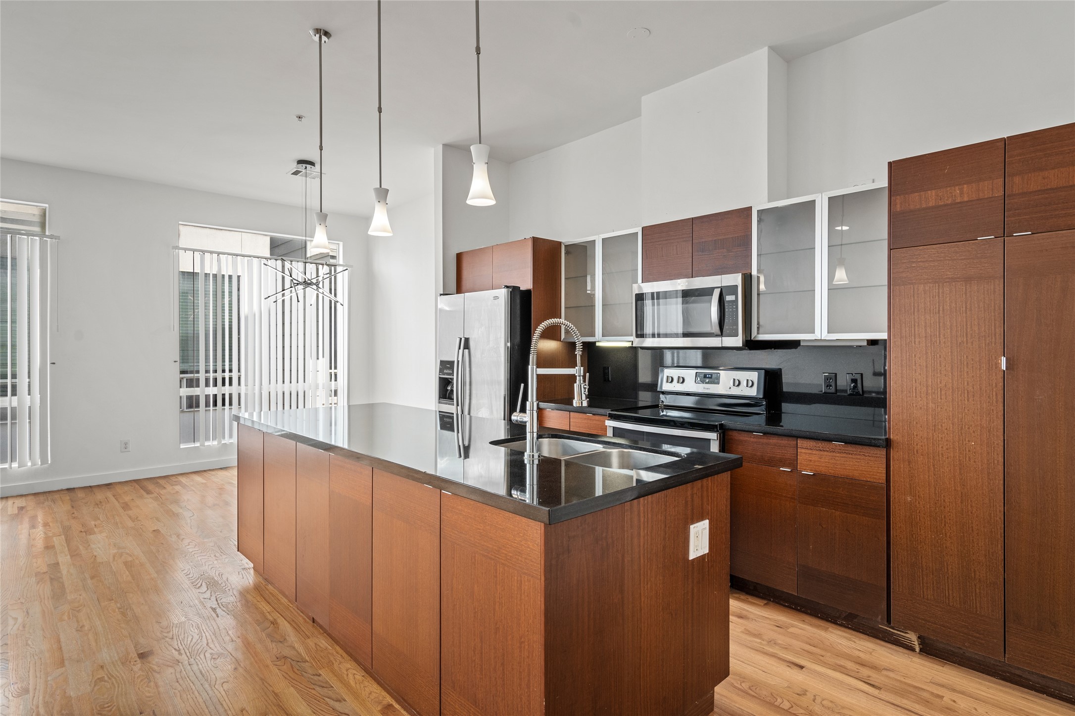 Sleek kitchen with modern fixtures and ample natural lightperfect for your culinary adventures!
