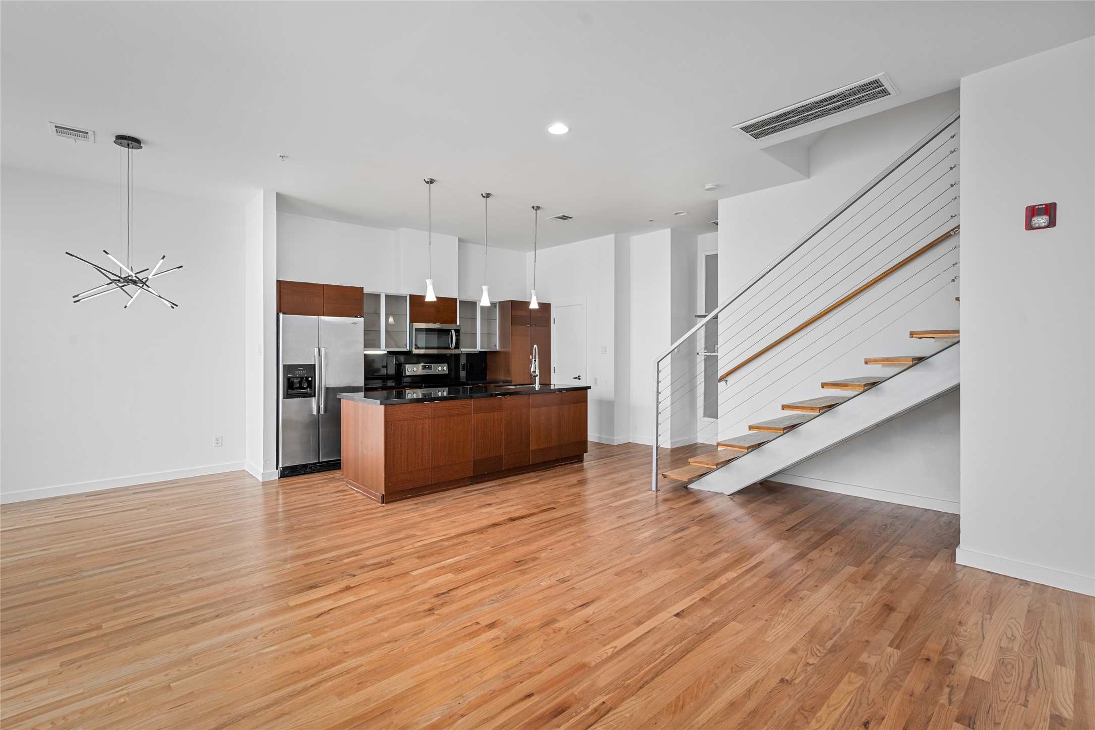 The open concept layout ensures you're always in the know, whether you're in the kitchen, dining, or living area, creating a connected and cohesive space for family and guests to enjoy.