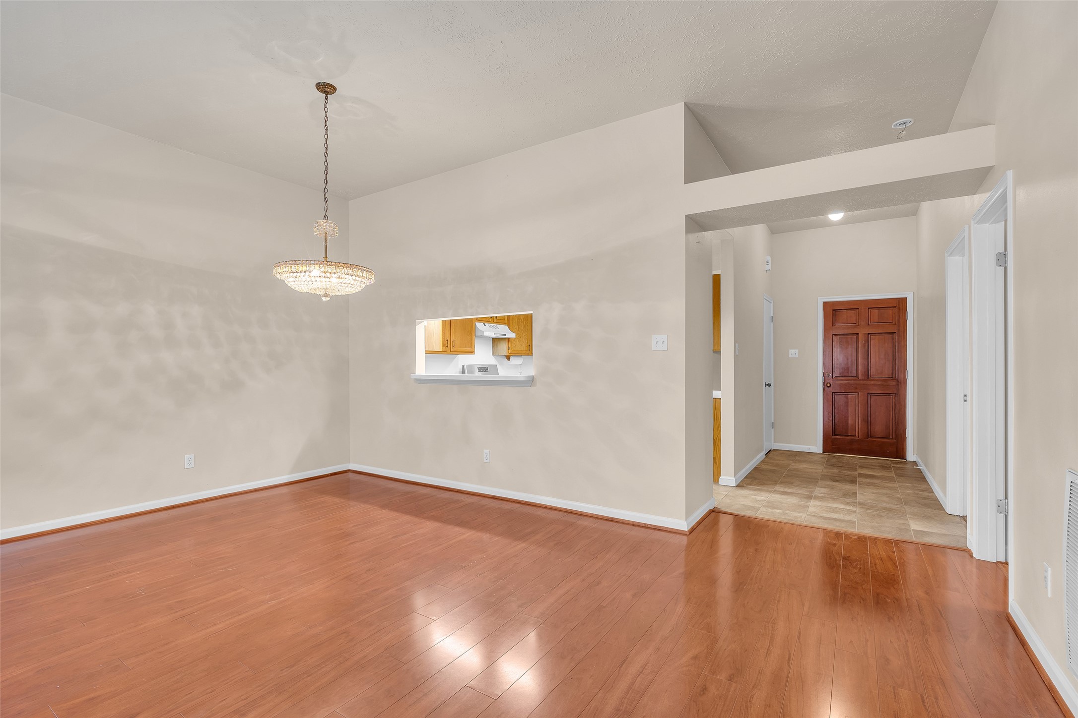 As you enter the home, you will find a foyer with a view of the living room and dining area. As you enter the home, you will find a foyer with a view of the living room and dining area.