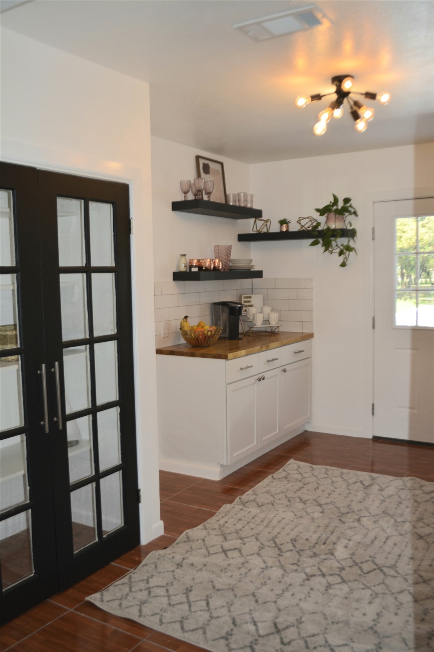 Kitchen with Black Doors for Pantry