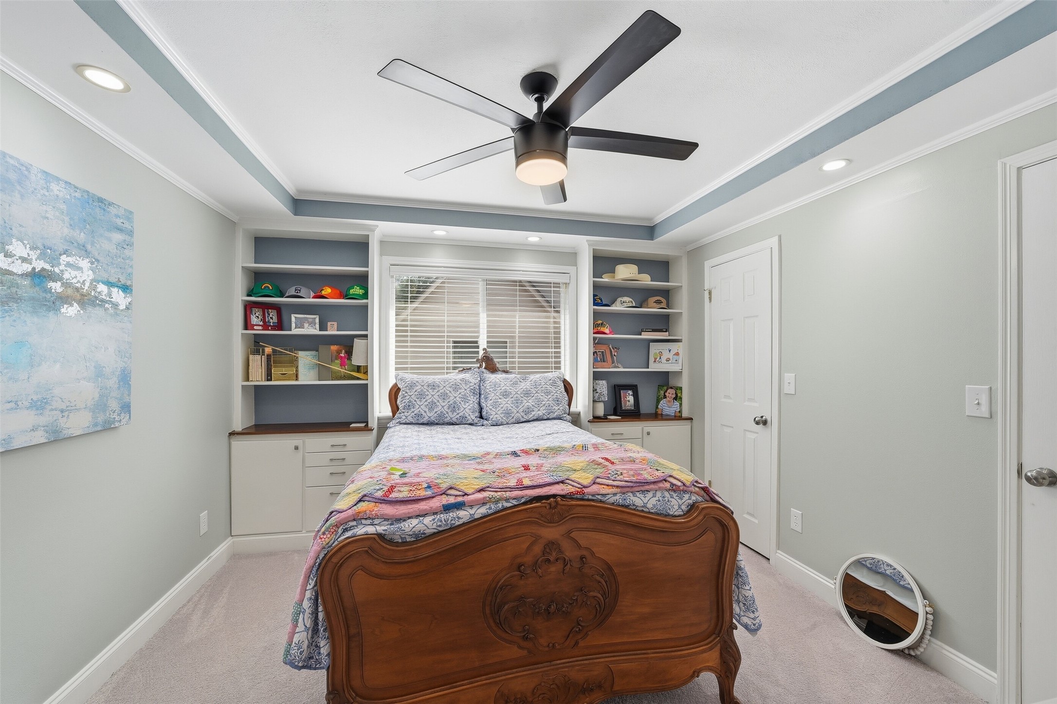 Bedroom 1 with built-ins and large closets.