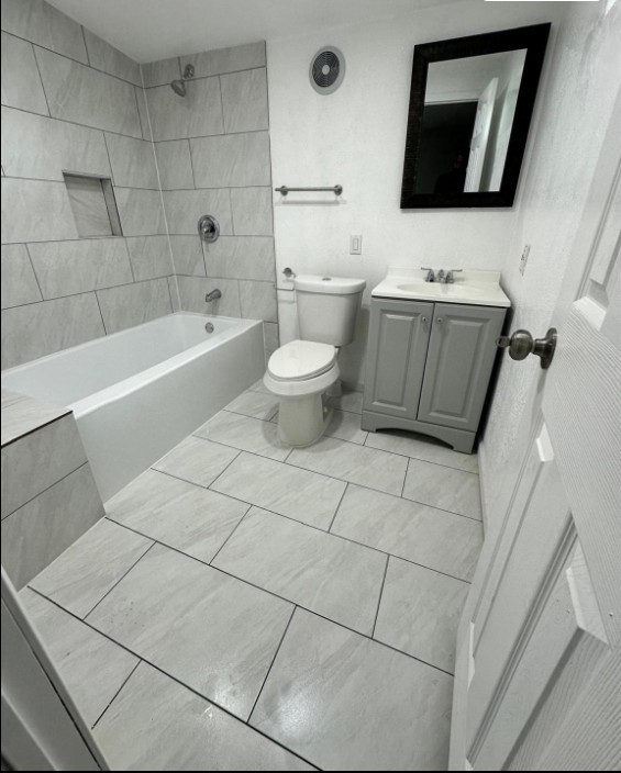 Attached master bathroom with soak in tub