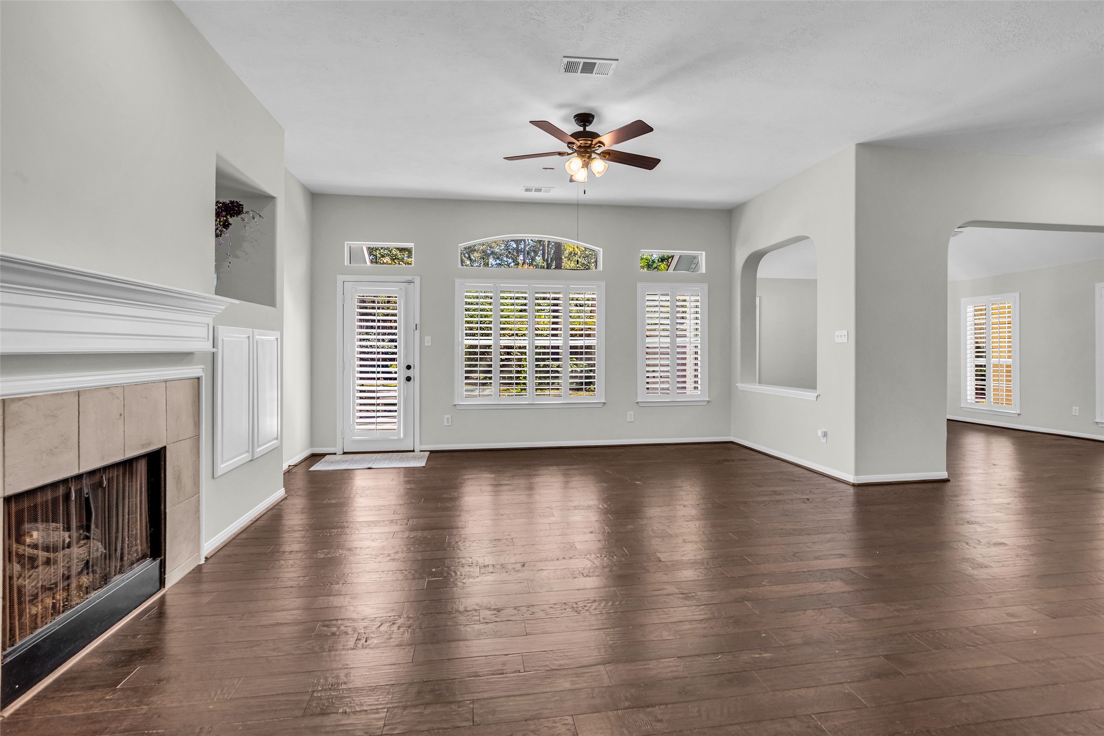 Living Room with tons of natural light and plantation shutters