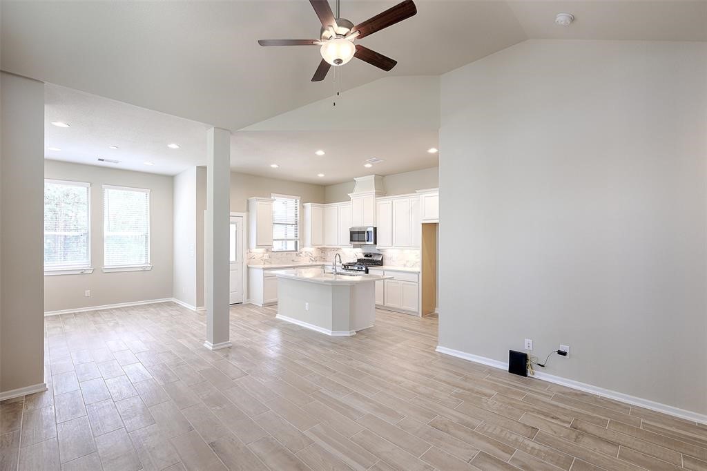 Open living area with island kitchen
