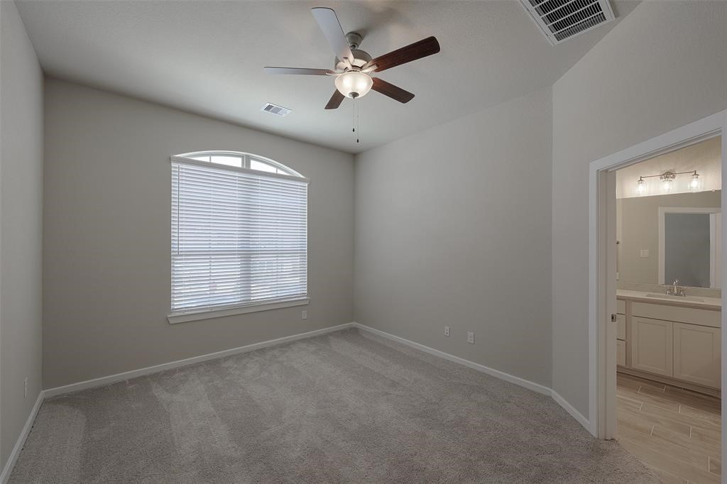 Large secluded primary bedroom on main living area.