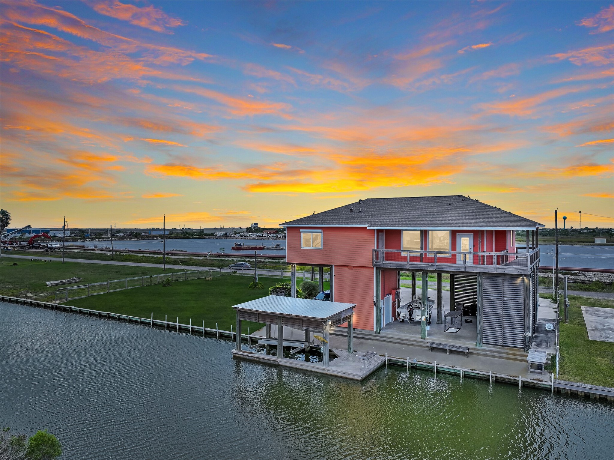 Welcome to your waterfront paradise, located within a gated subdivision. Whether you are into fishing, birding, boating, kayaking, or paddleboarding - this home will immerse you in it all. Get ready to witness the most unbelievable sunsets imaginable!