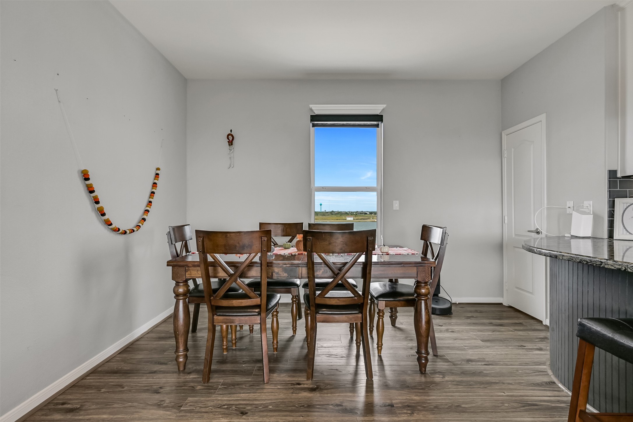 Dining area with a backdrop of Highland Bayou.