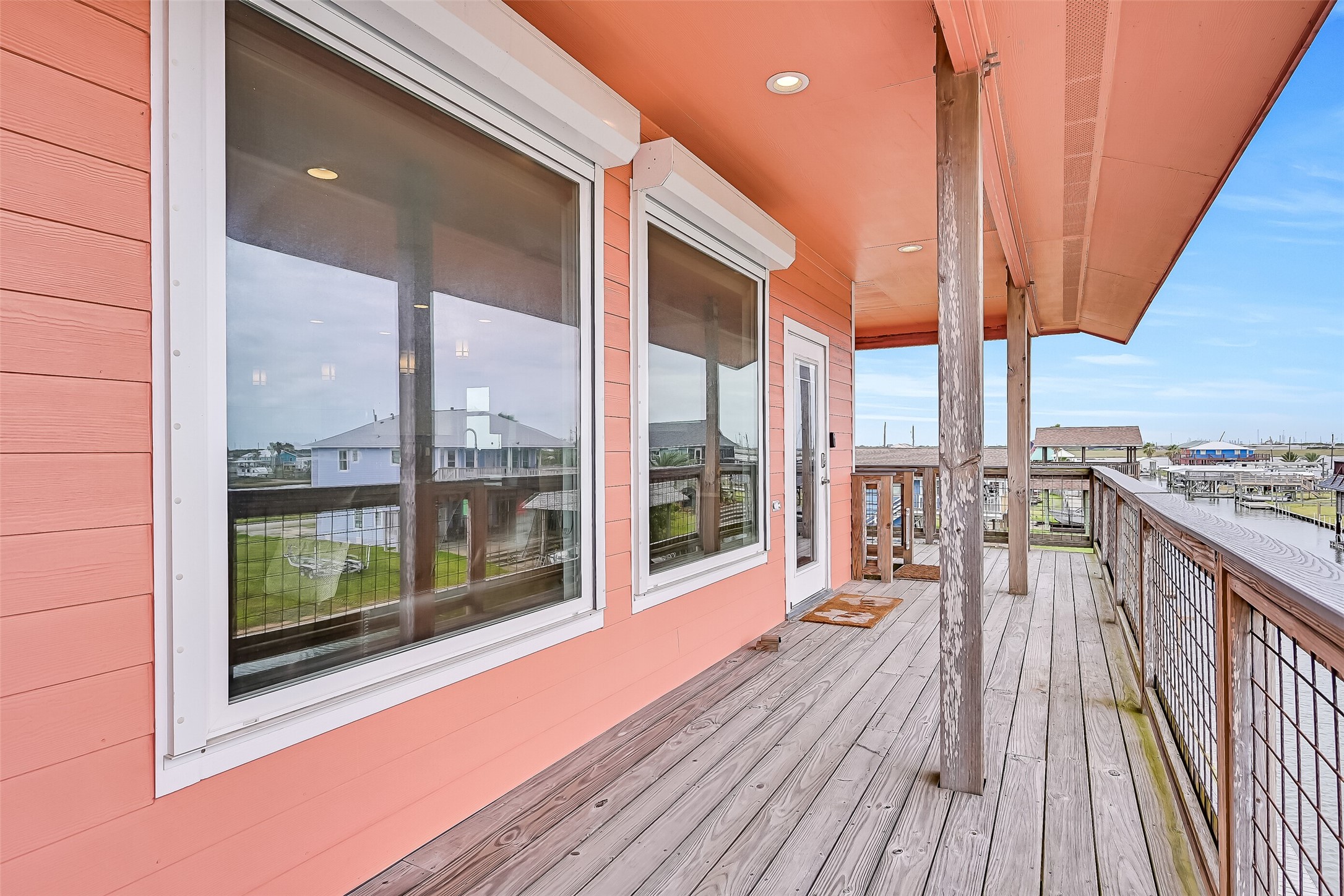 The white boxes situated above each window houses electronic shutters - even though you have double-pane windows, this allows you to lock and leave at a moment's notice.