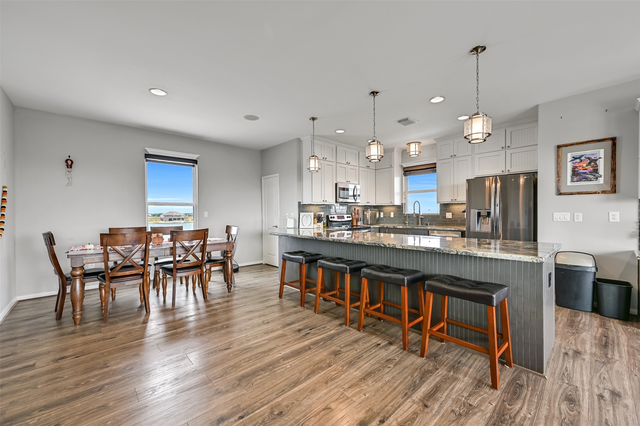 Now we come to the heart of this home. The showstopper kitchen, which is open to the rest of the entertaining areas. Notice it is also open to the dining area giving you so many seating options.