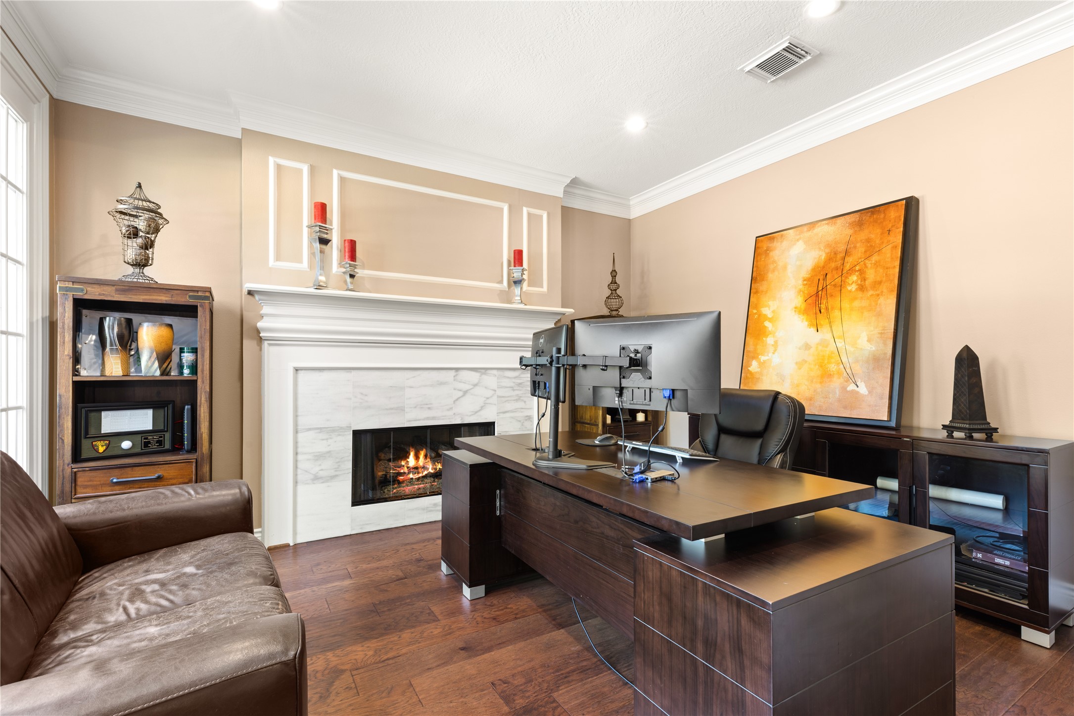 Study with gas fireplace at front of home Study with gas fireplace at front of home