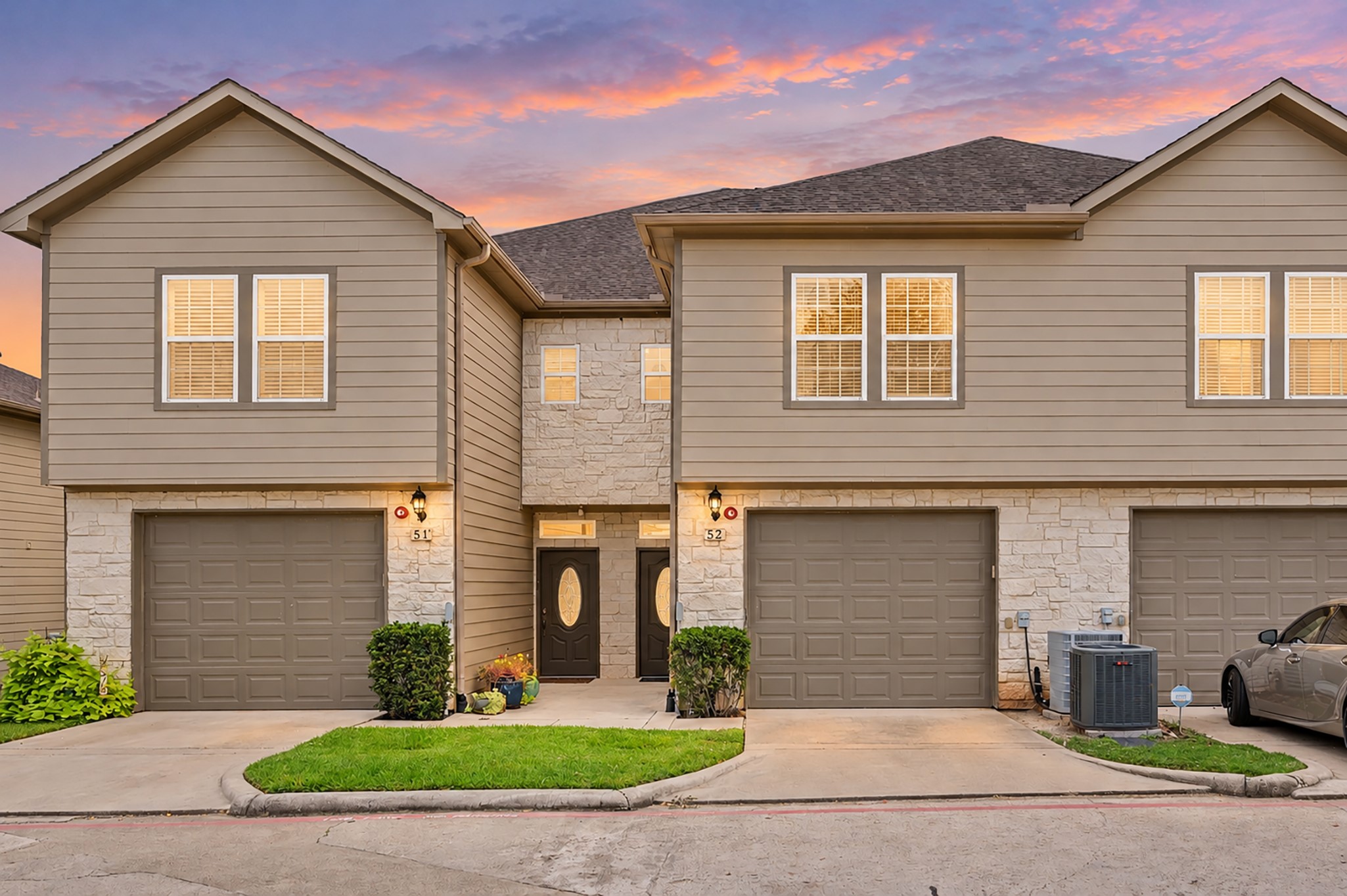 evening view of townhome front