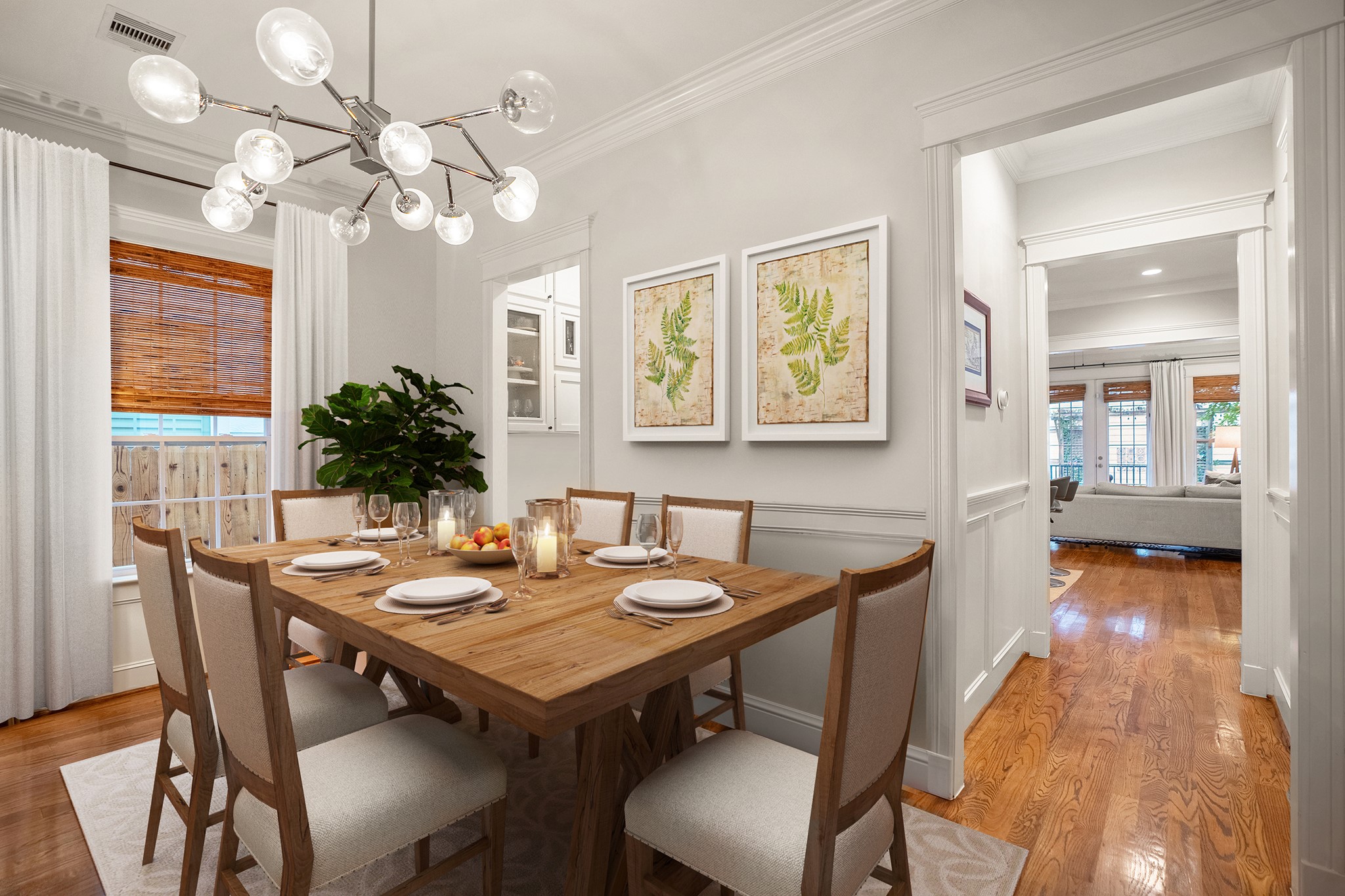 This is a staged picture with a dining room table. This space is large enough to seat 10-12 for your holiday dinner parties. This is a staged picture with a dining room table. This space is large enough to seat 10-12 for your holiday dinner parties.