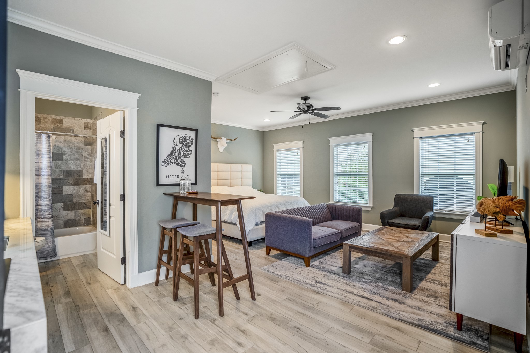 The large open space holds a king-sized bed.