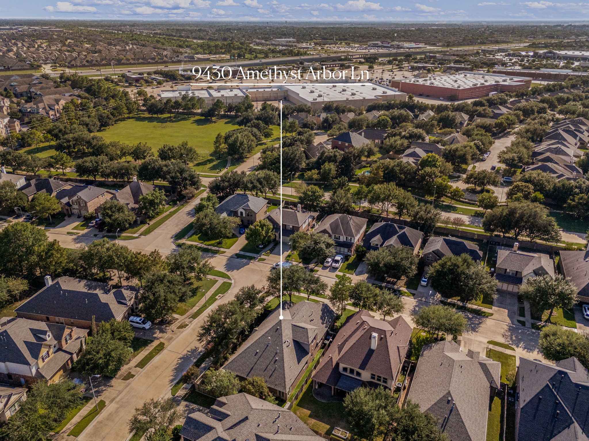 This spectacular aerial view perfectly captures the prime positioning of the home within the highly desirable Cinco Ranch Southwest master-planned community.