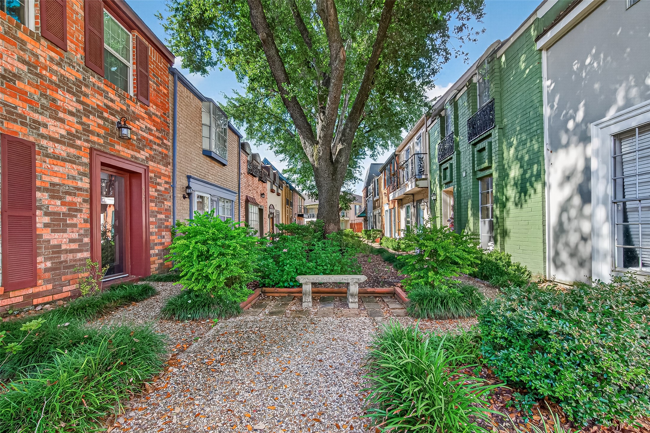 Gorgeous landscaping and concrete benches throughout the complex