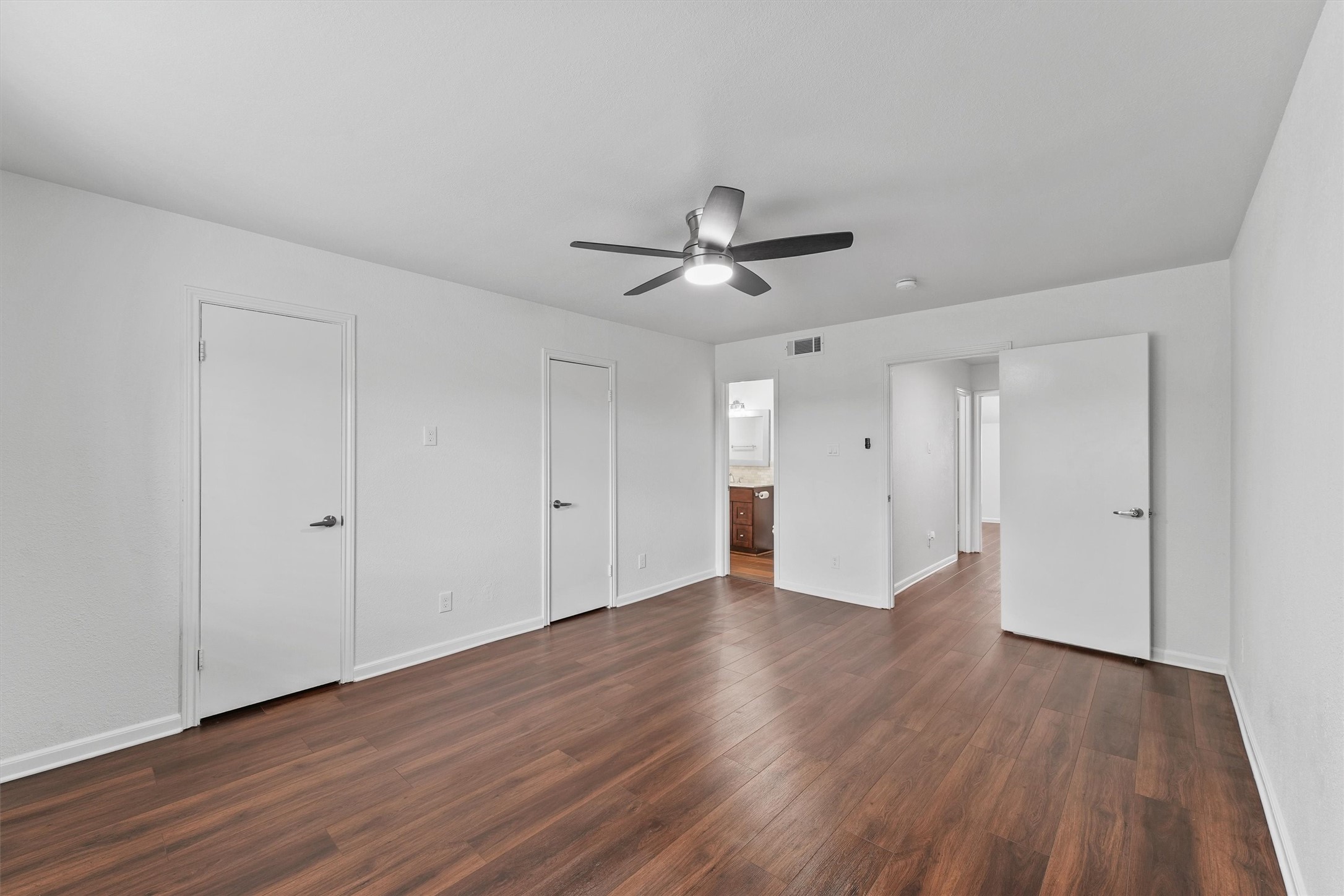 Dual closets in the primary bedroom