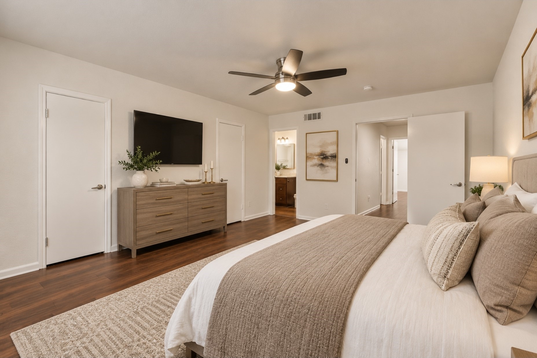 Another view of the primary bedroom staged