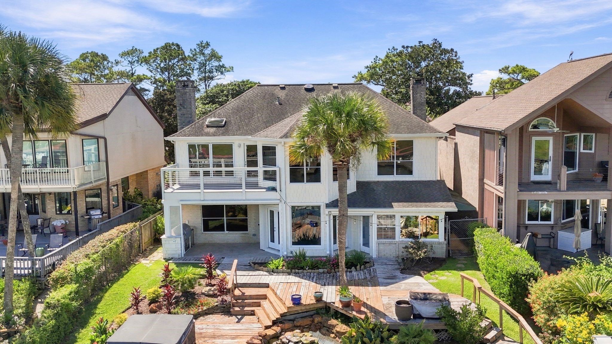 An aerial view shows off the home's waterfront setting on Clear Lake.