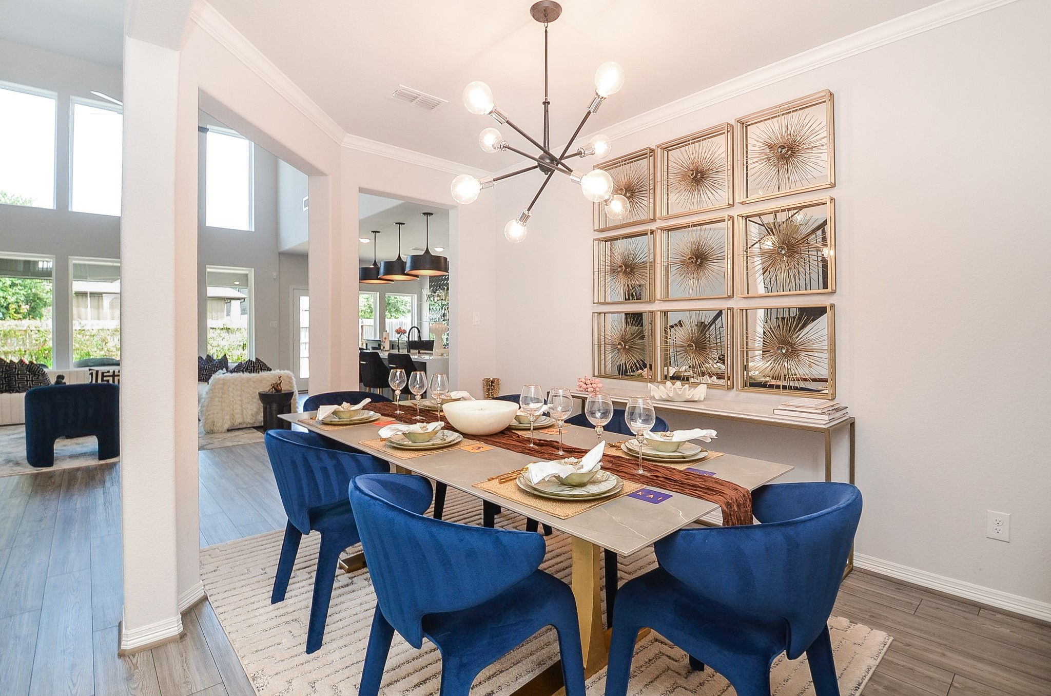 Elegant dining area that seamlessly flows into a spacious living room with abundant natural light.