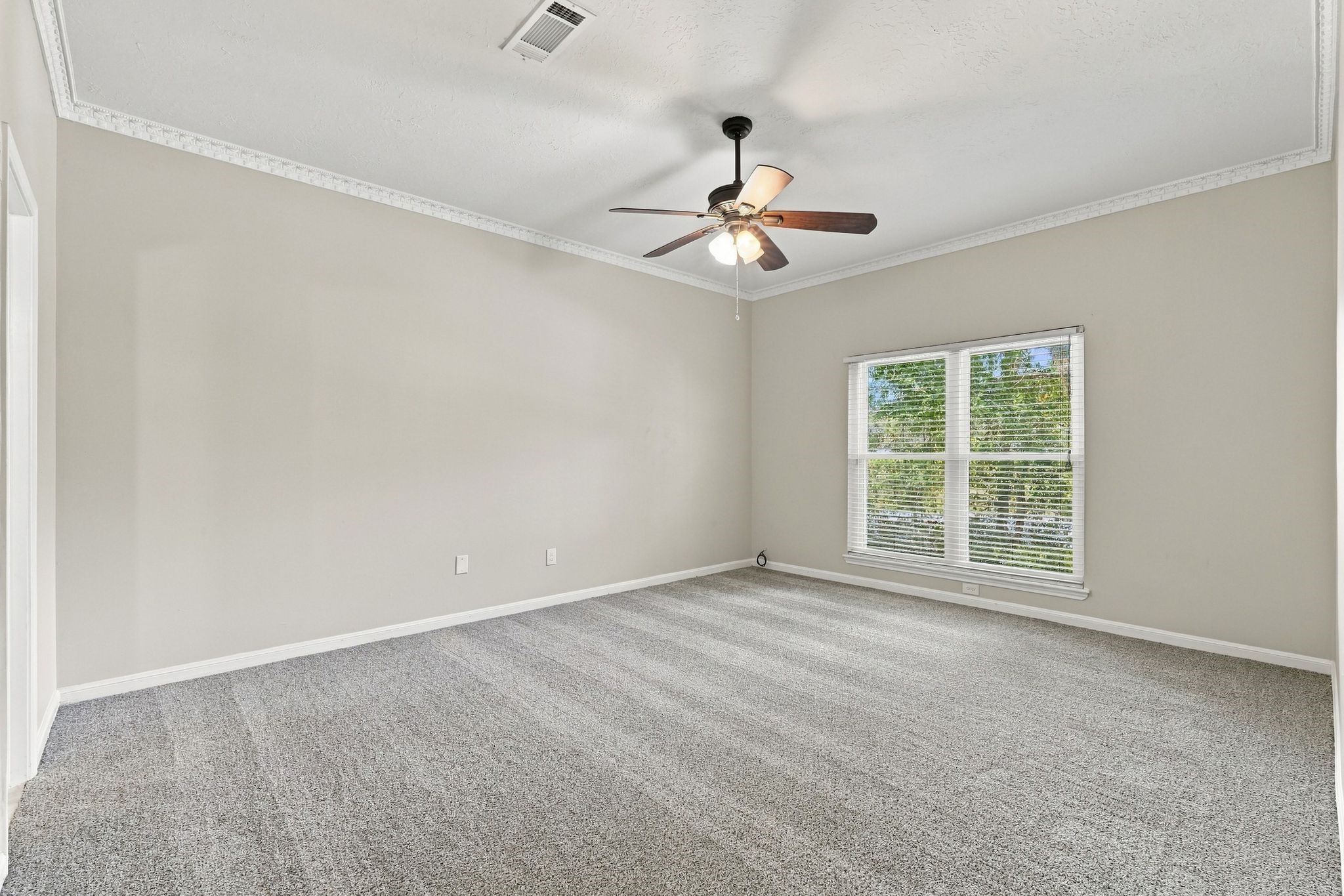 Primary bedroom with new carpet