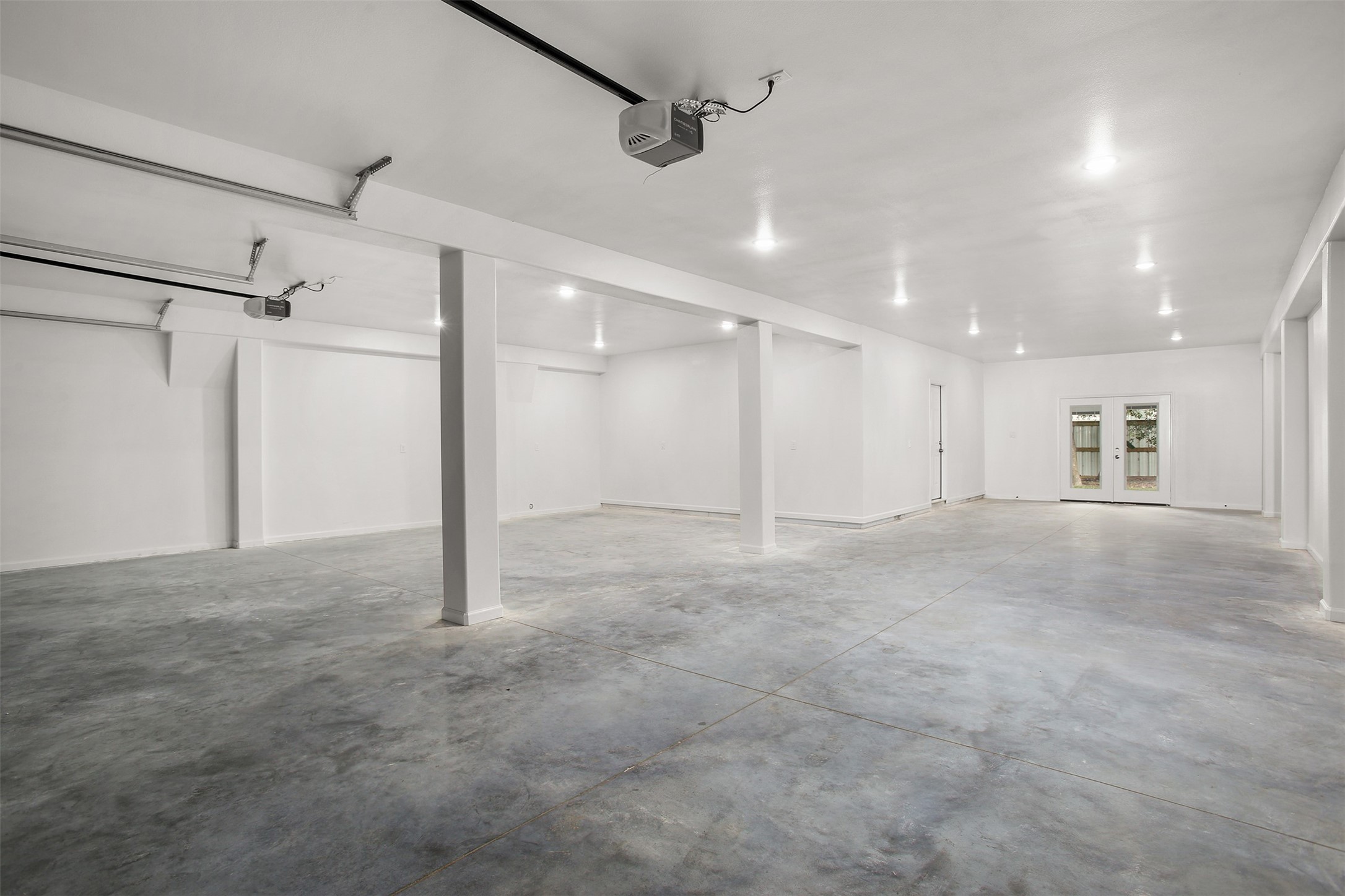Massive 4 car tandem garage with french doors to the backyard Massive 4 car tandem garage with french doors to the backyard
