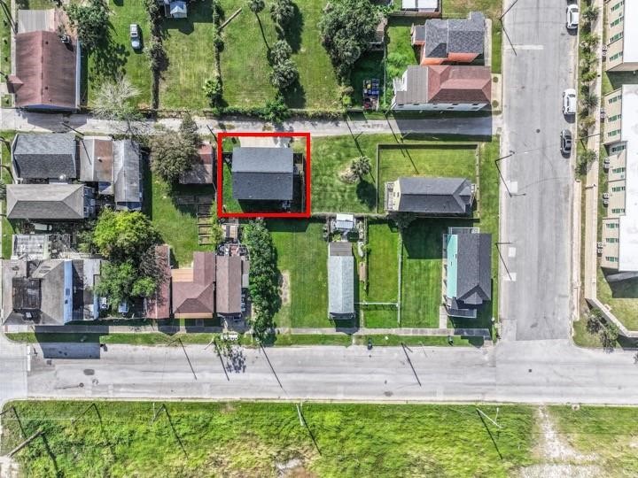 The property is outlined in red.