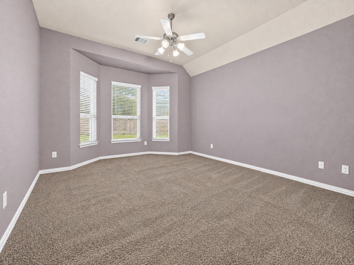 Luxurious first-floor primary suite with a private ensuite bath.