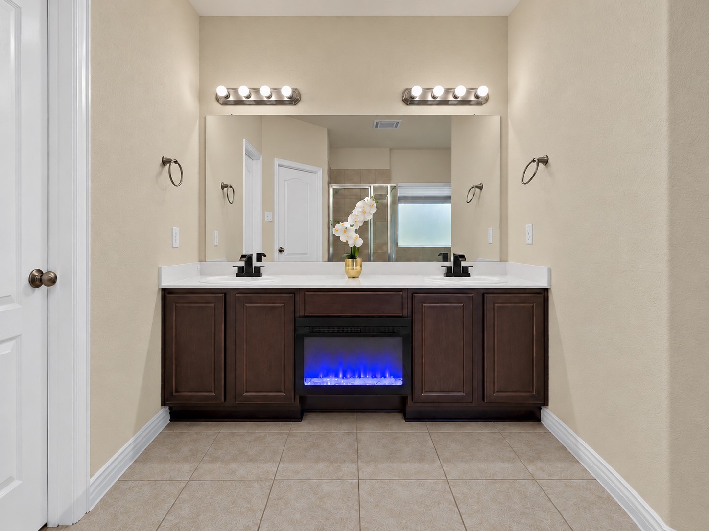 Your own peaceful retreat! Unwind in this inviting primary bath featuring dual sinks, generous counter space, and a soothing spa-like ambiance.