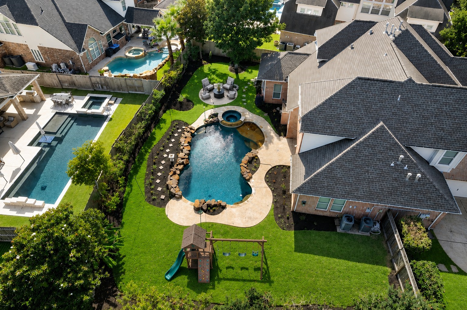 Stunning backyard oasis featuring a large, uniquely shaped pool with a connected spa, lush landscaping, perfect for outdoor entertainment and relaxation. Stunning backyard oasis featuring a large, uniquely shaped pool with a connected spa, lush landscaping, perfect for outdoor entertainment and relaxation.