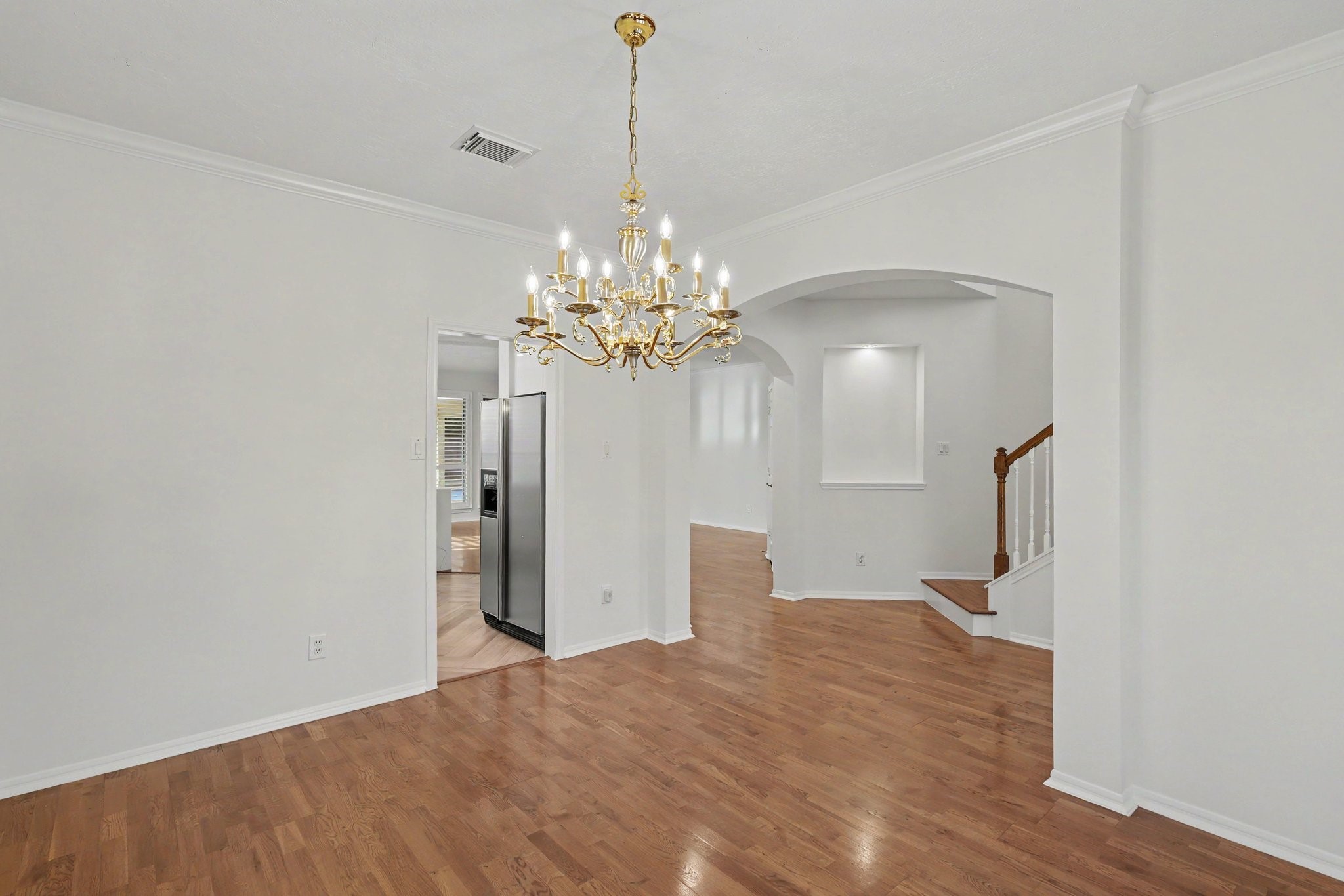 Formal dining area leads directly into kitchen.