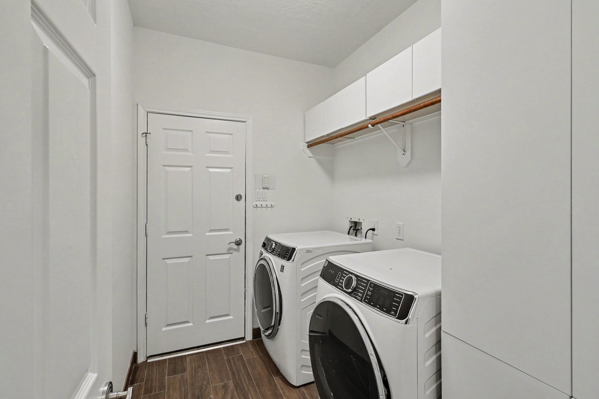 Utility room leads to garage.