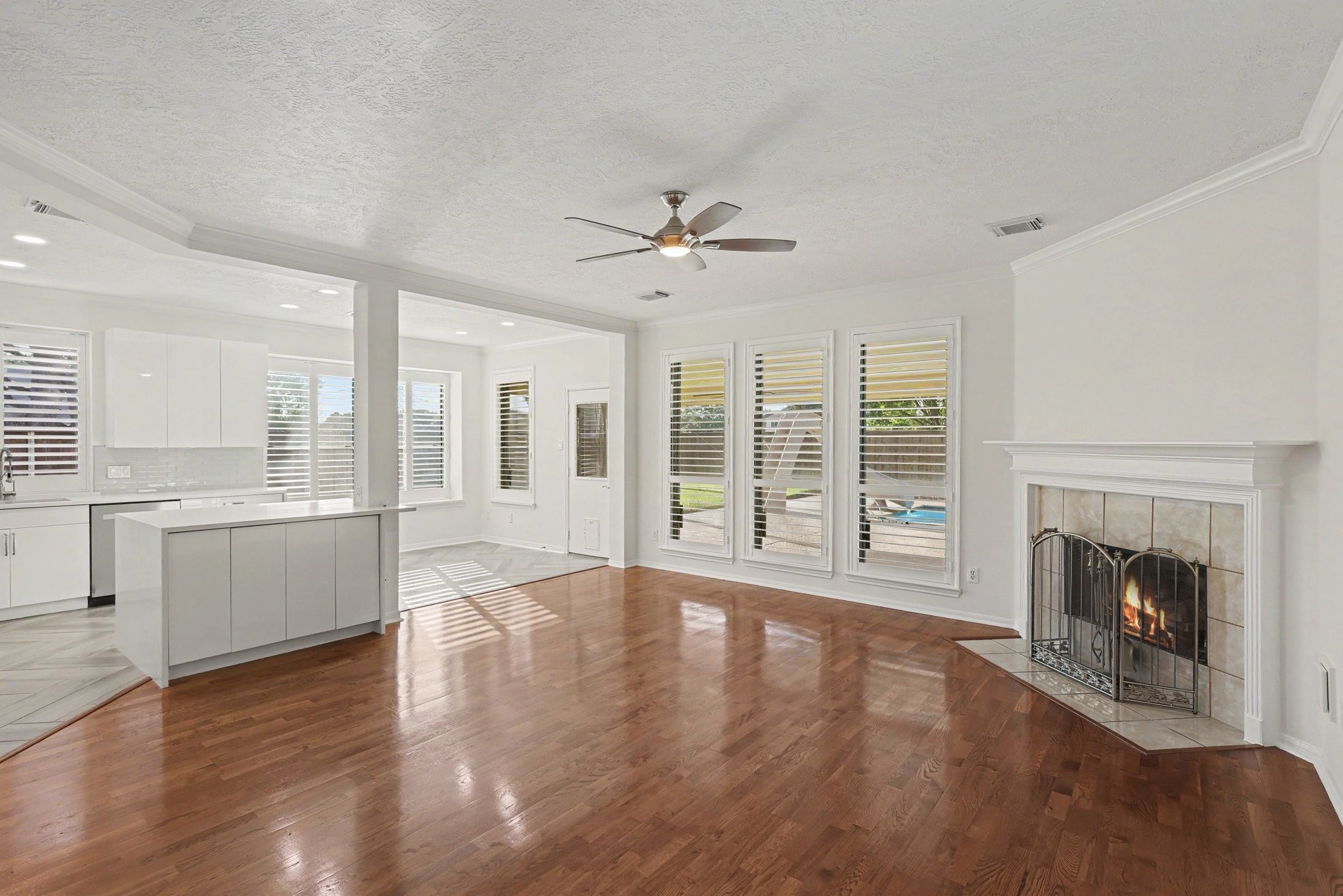 Family living area open to kitchen.