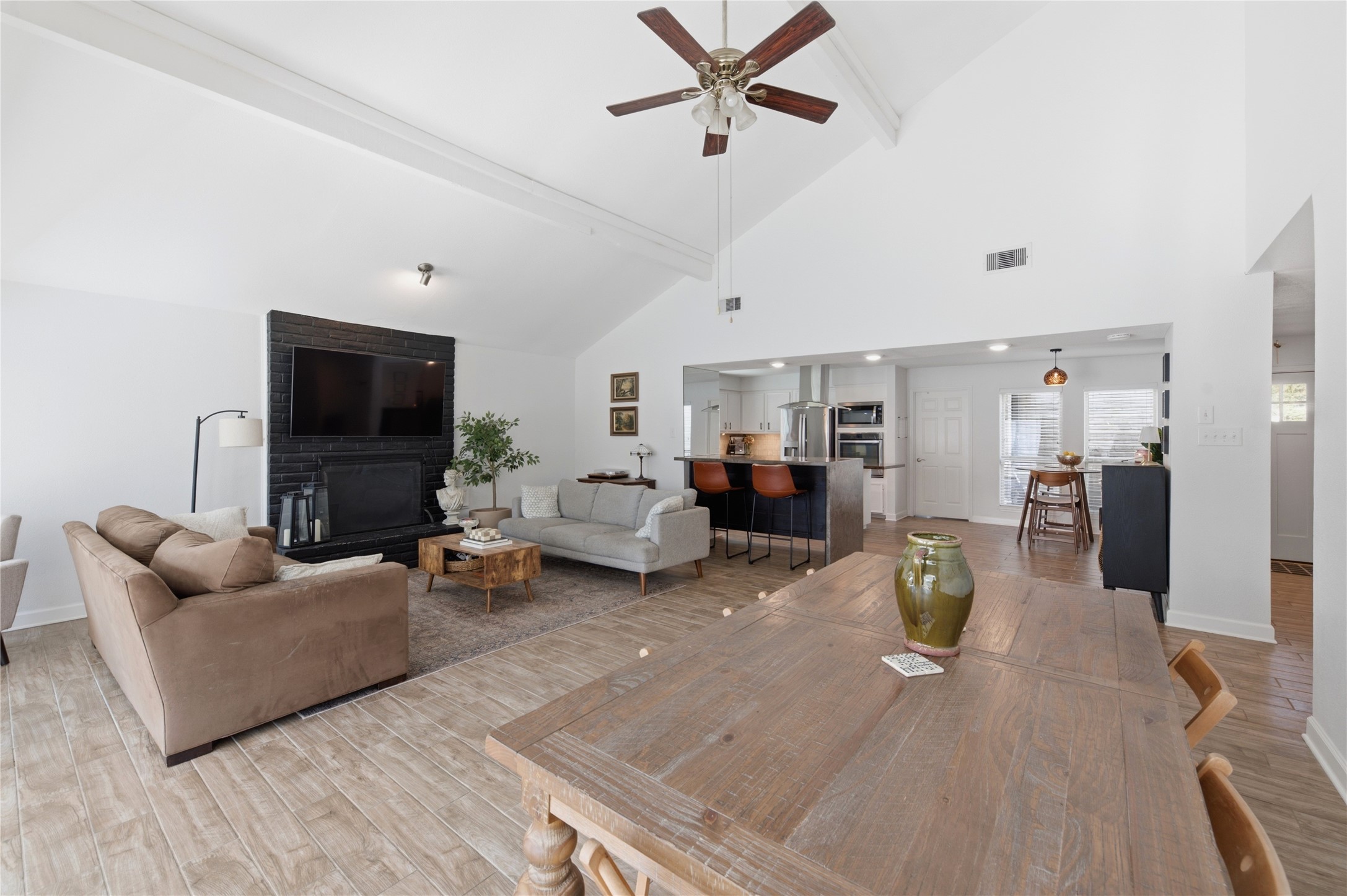 Soaring vaulted ceilings create an airy, expansive atmosphere.