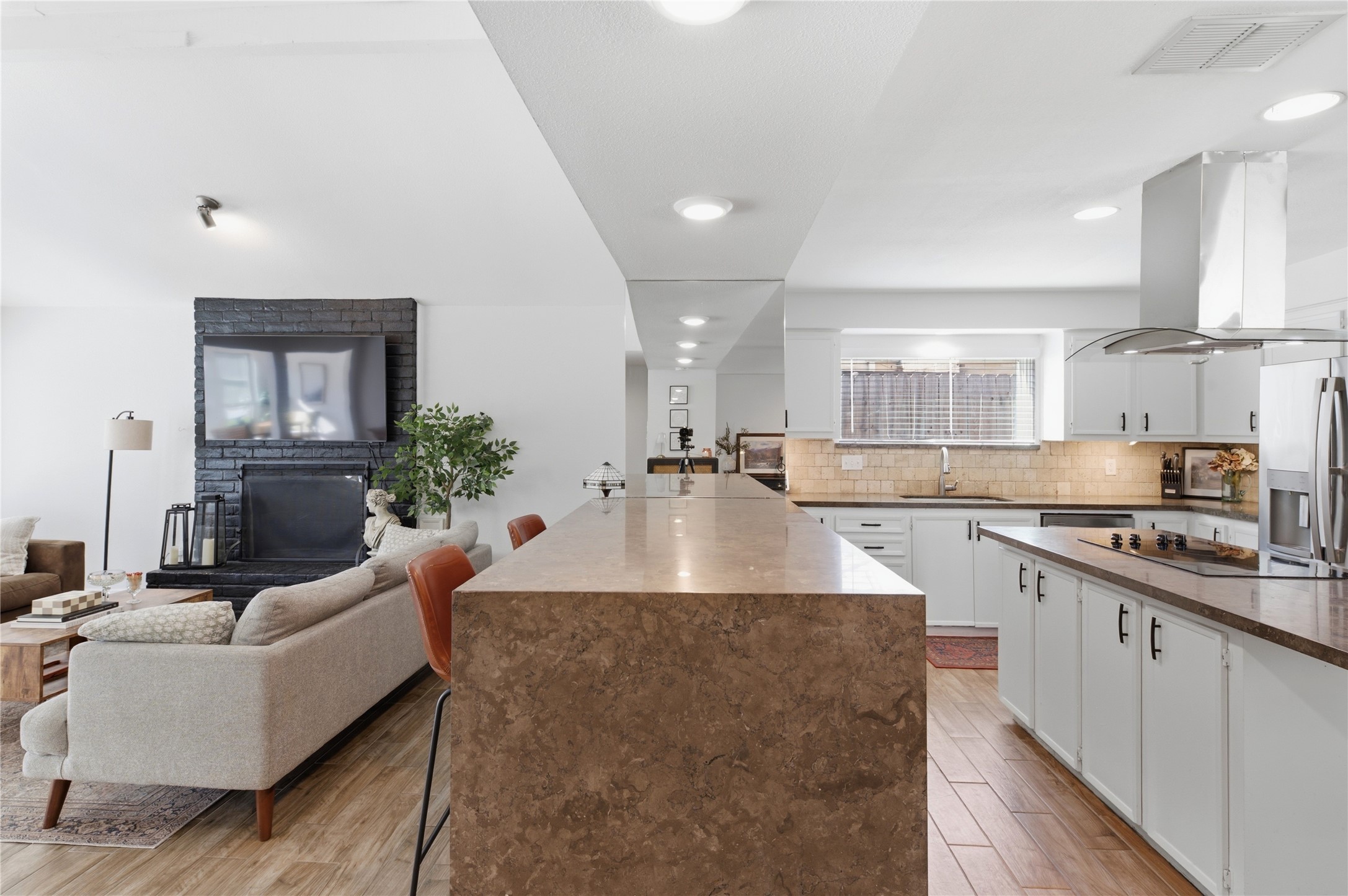 The kitchen flows seamlessly into the living room, making this home ideal for entertaining.