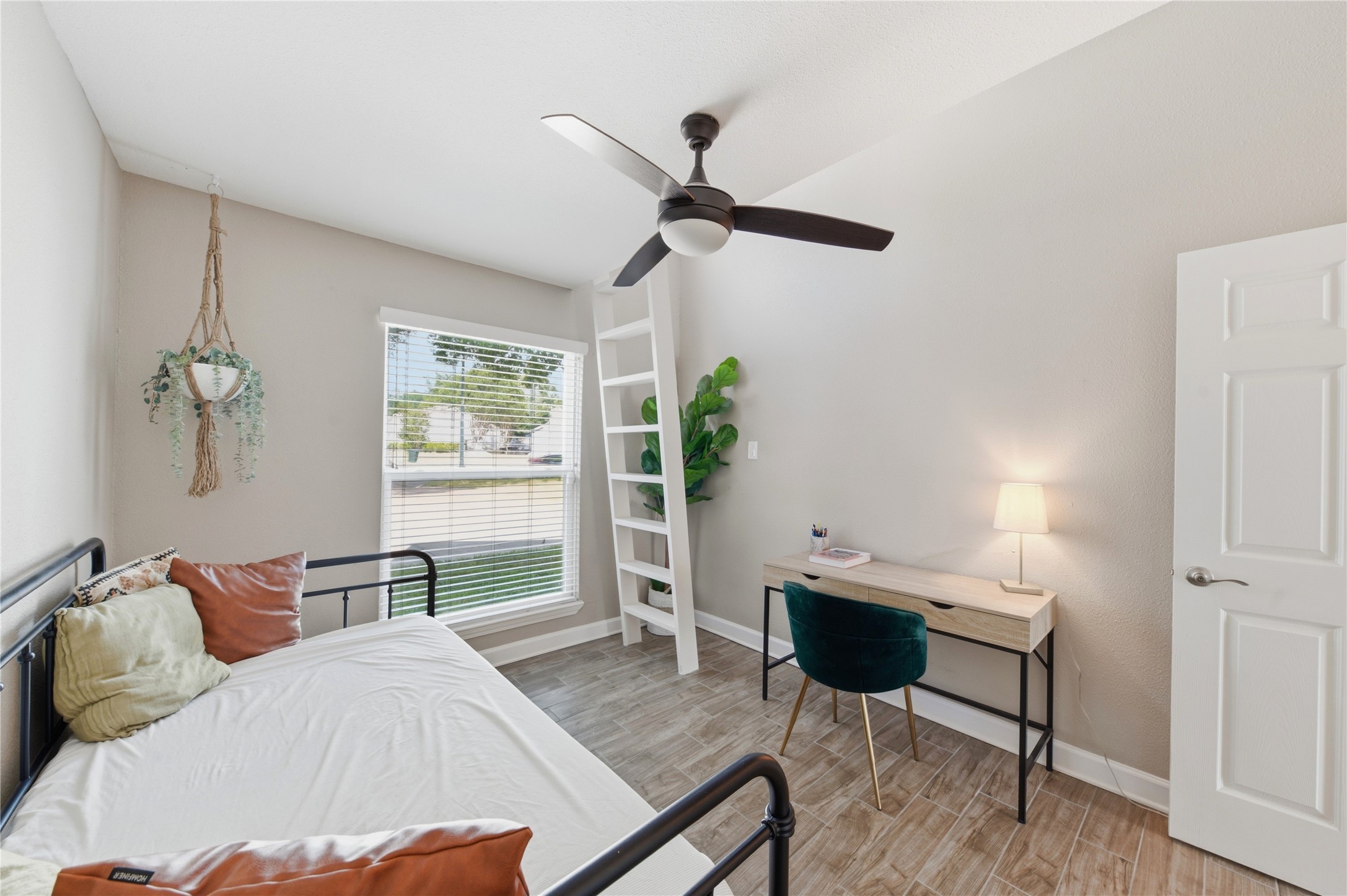 A large window provides brightness to this unique space!