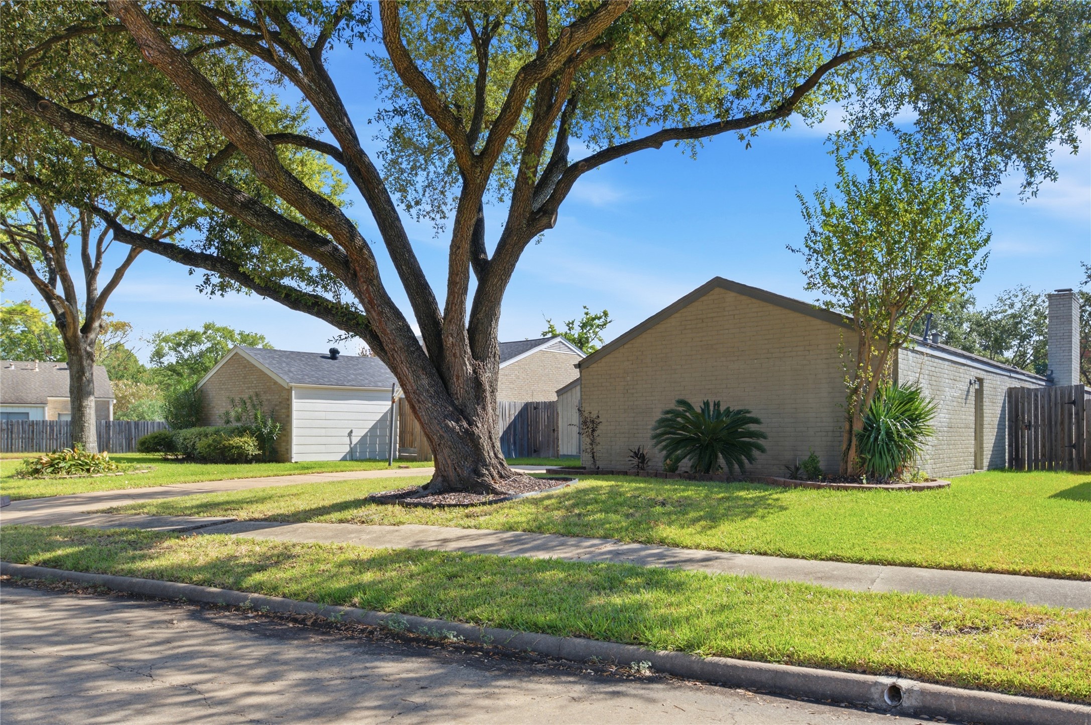 The home sits on a spacious lot with mature trees! The home sits on a spacious lot with mature trees!