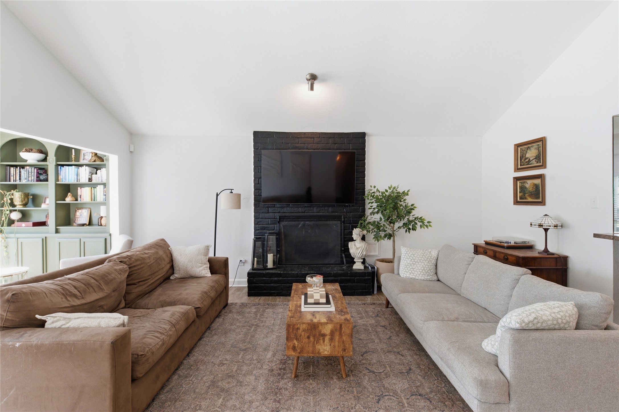Focal point fireplace adds warmth and character to the living room.