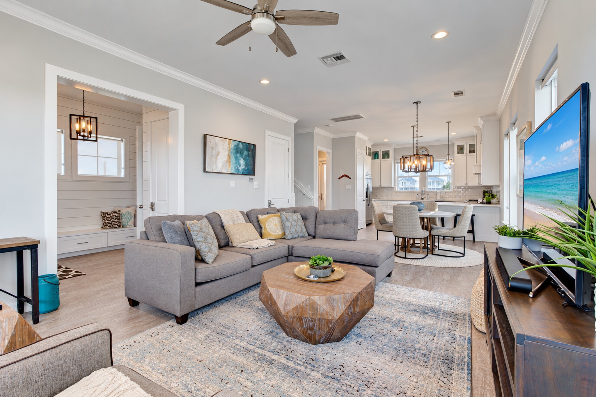 Throughout the home you will find crown molding, recessed lighting, custom window treatments, wood look tile flooring & designer fixtures.