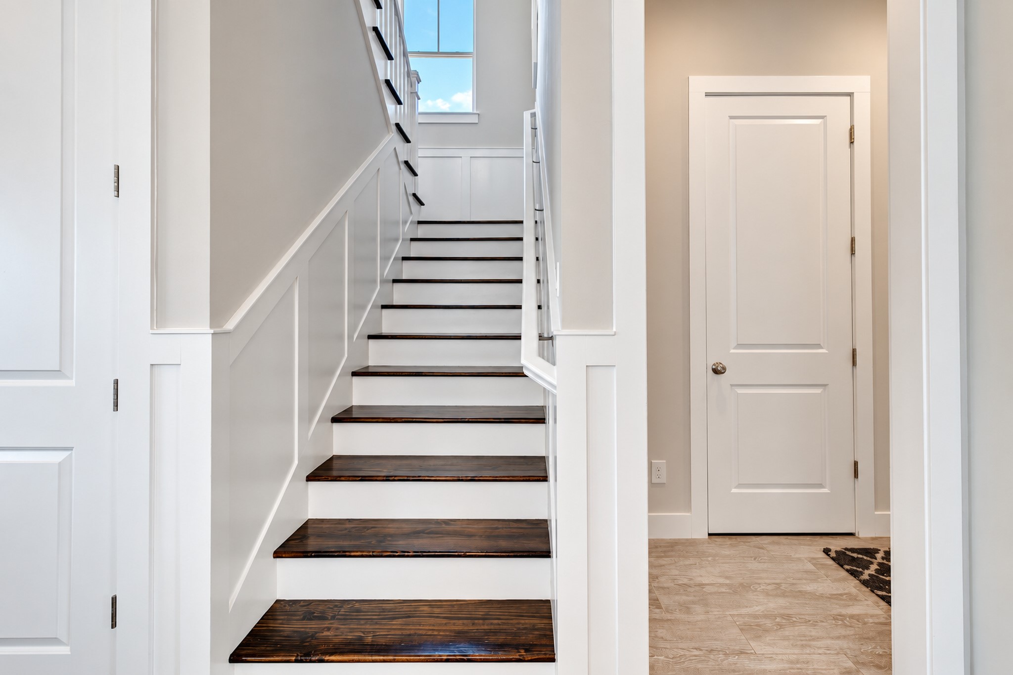 The stairs located off of the living room.