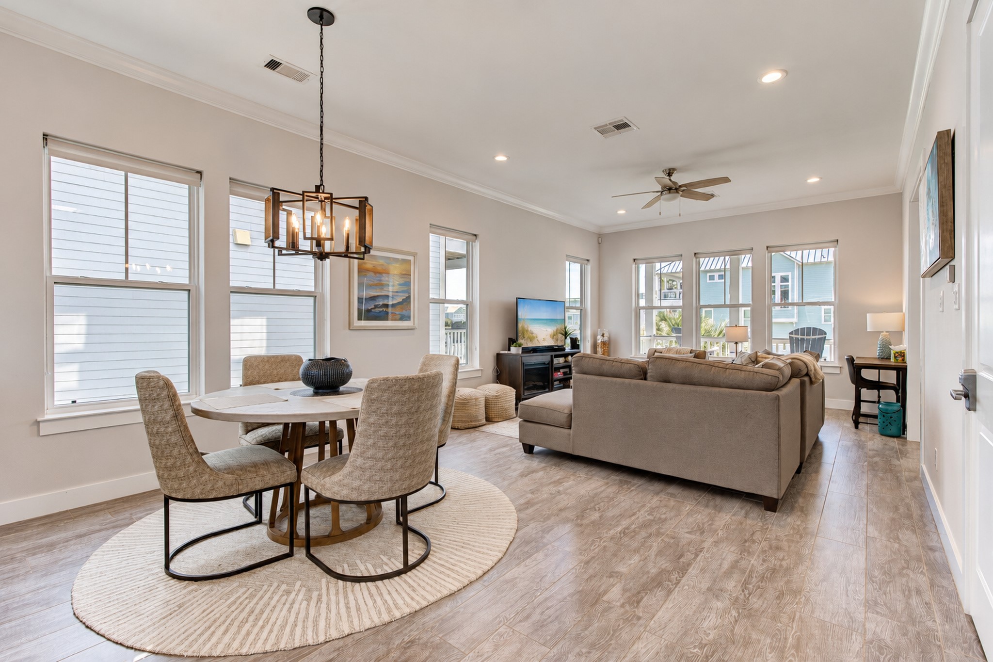 The dining room is located between the living room and kitchen. The dining room is located between the living room and kitchen.