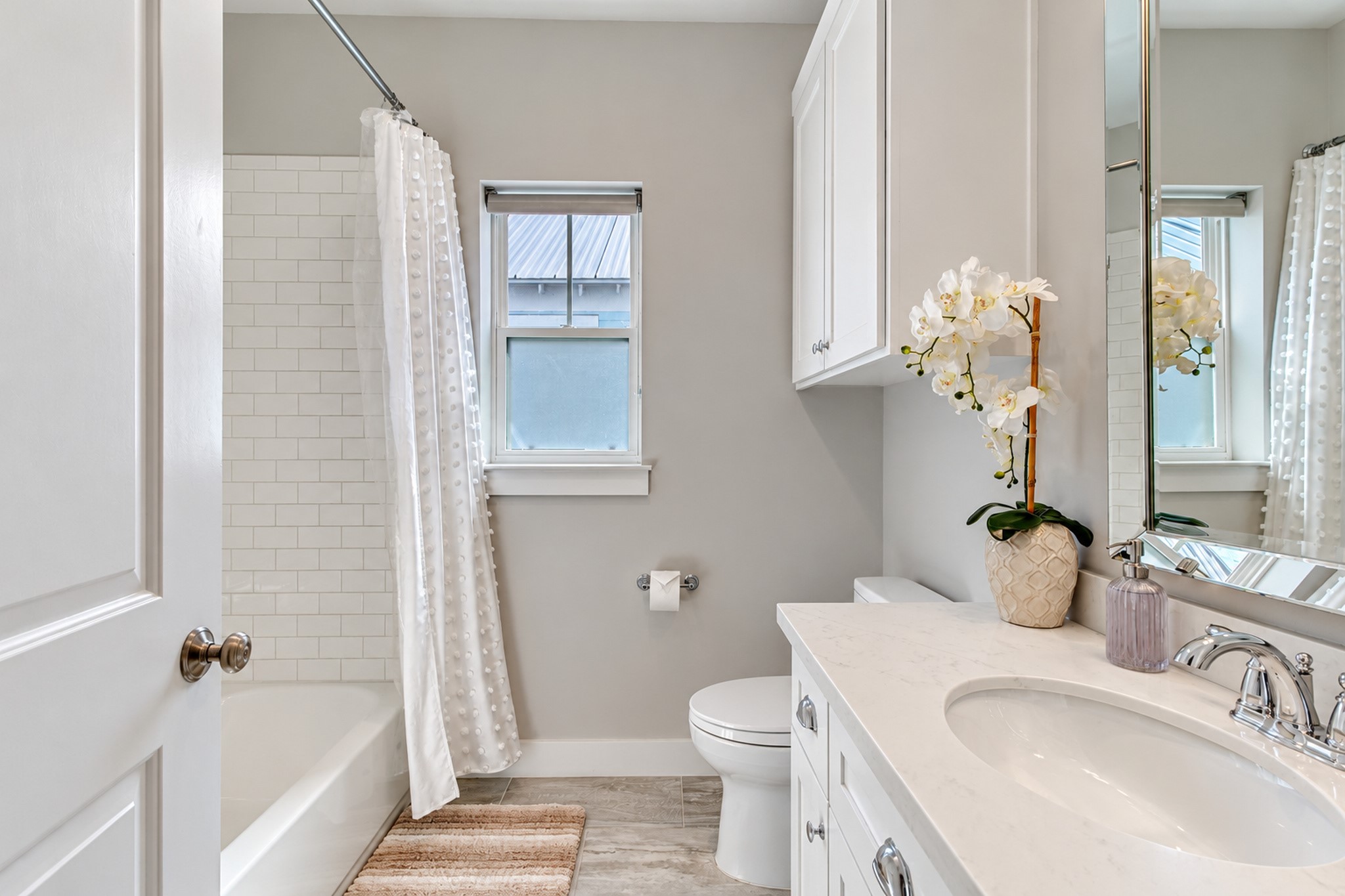 Guest bathroom located in the hallway upstairs.
