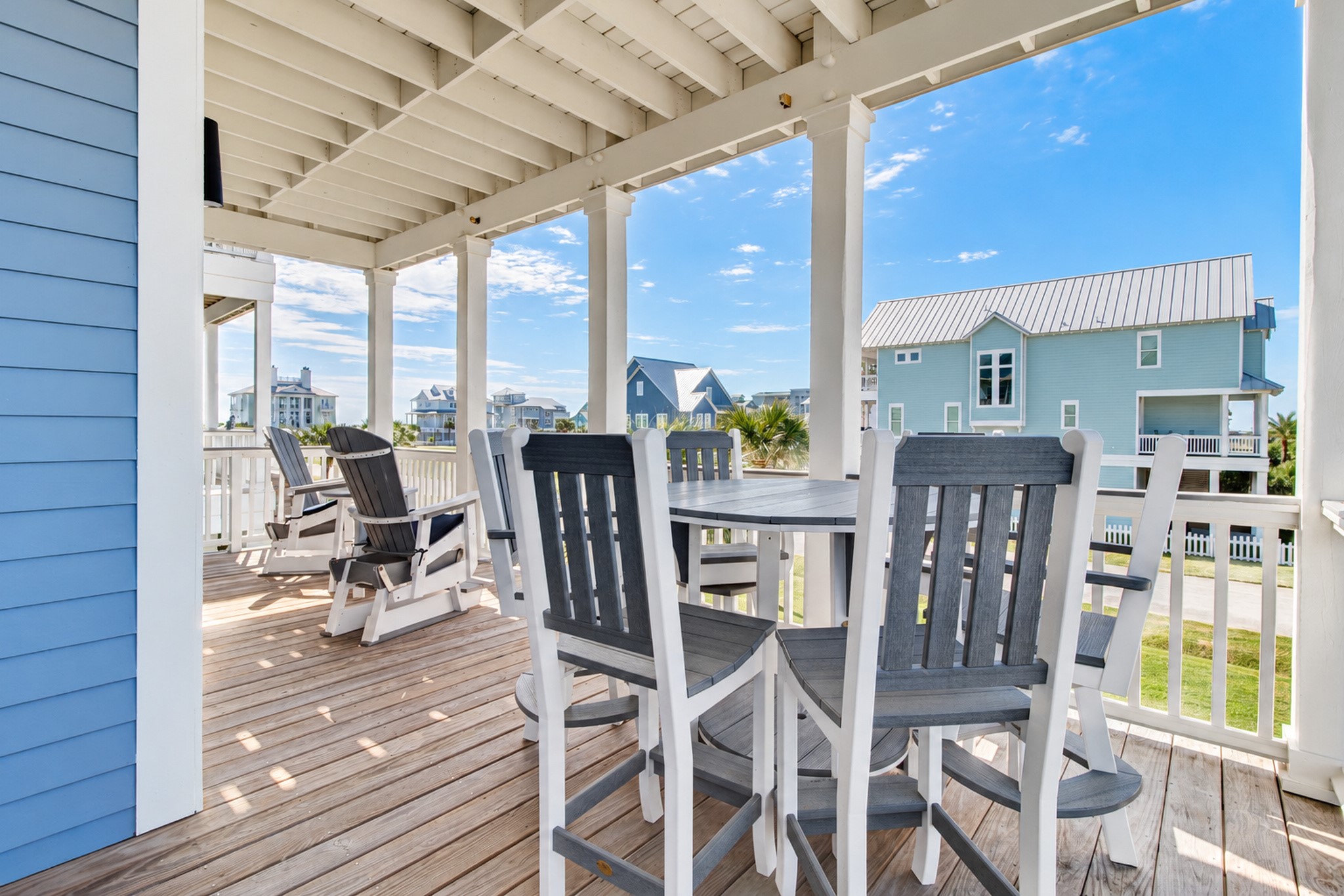West facing covered deck offers straight on views of the Gulf.