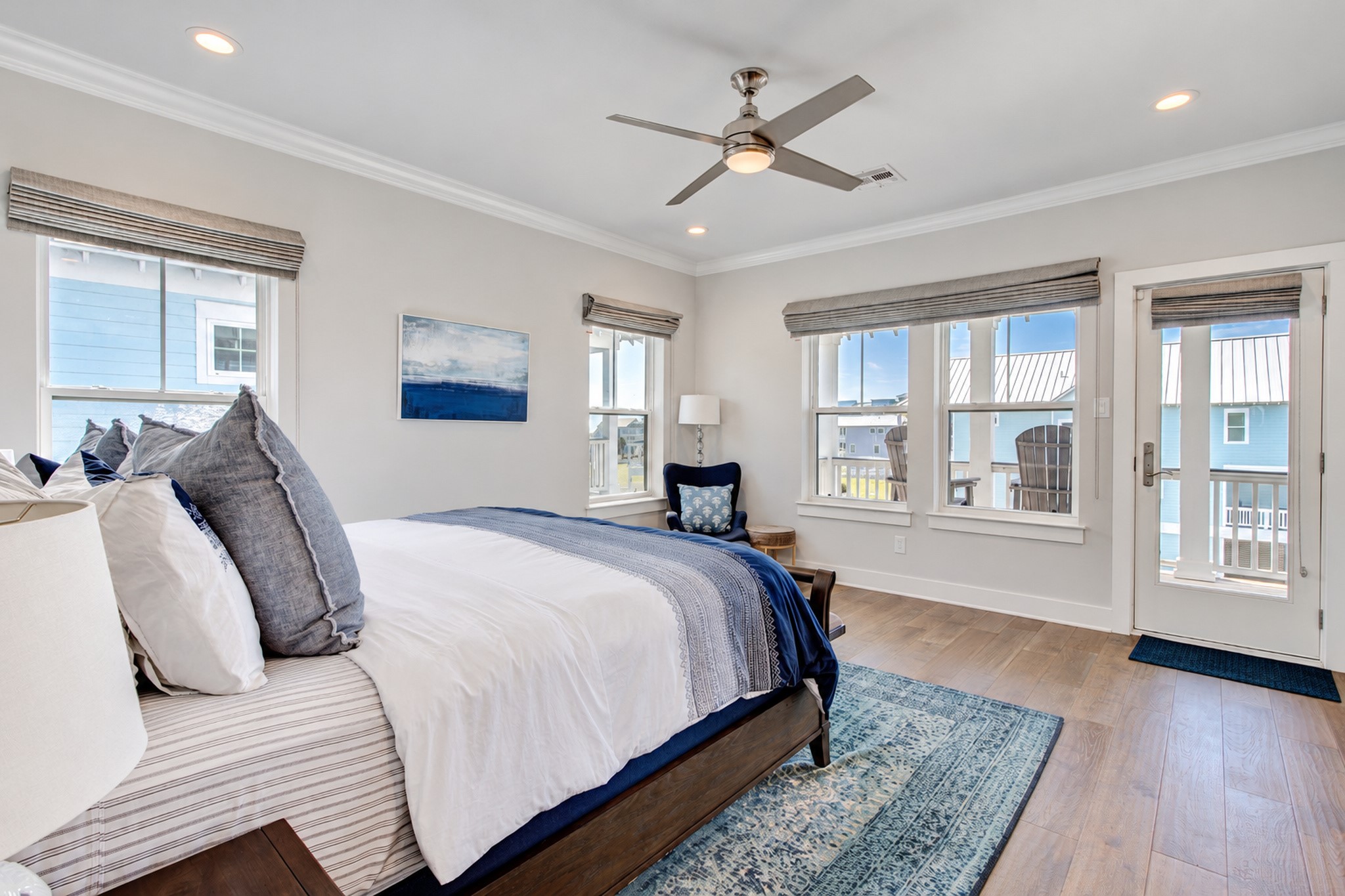 This spacious bedroom offers a walk-in closet, Gulf views and access to a private covered deck.