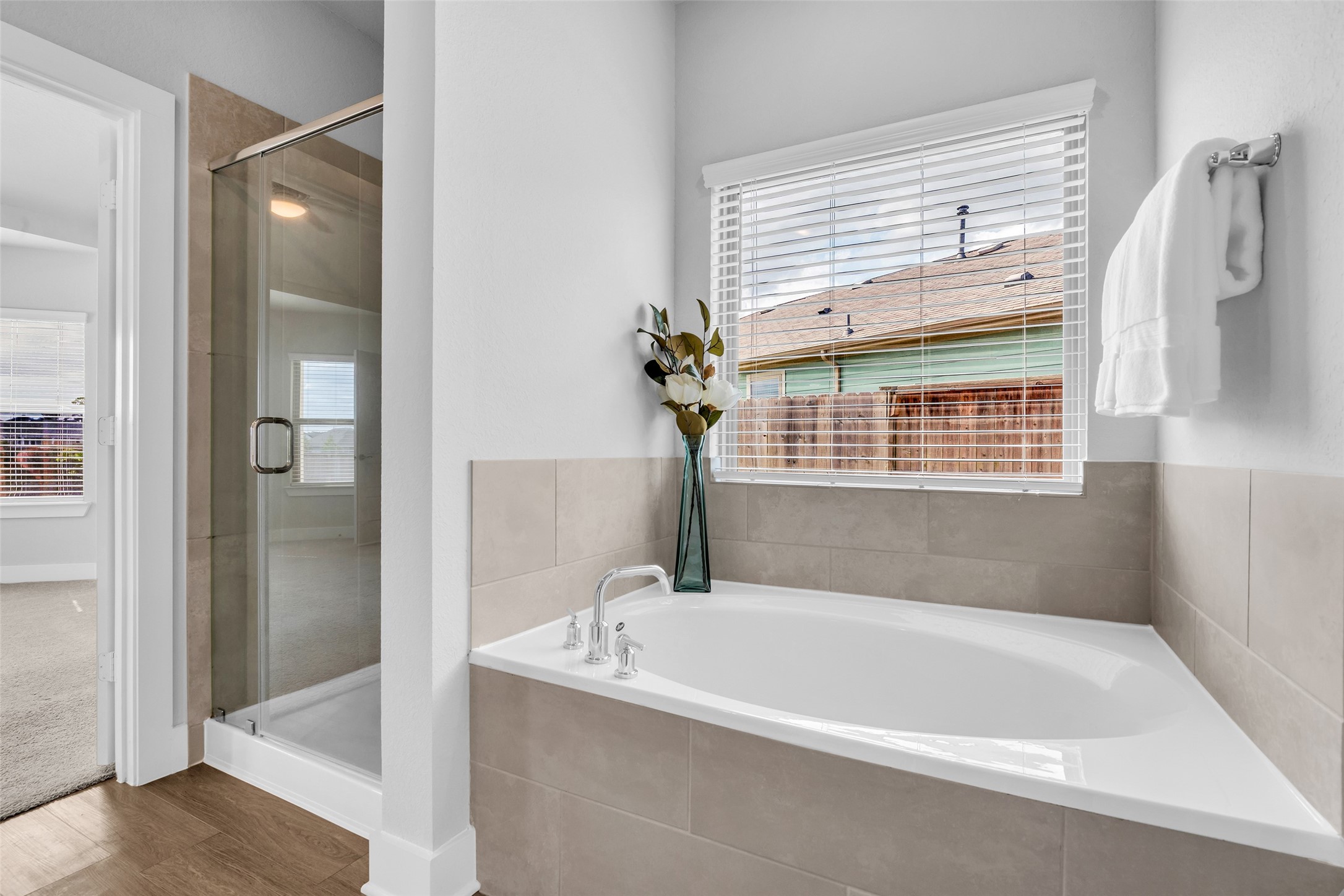 Seperate soaking tub and shower, plus walk in closet