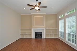 Living area with high ceilings and a wall of windows looking over your private yard