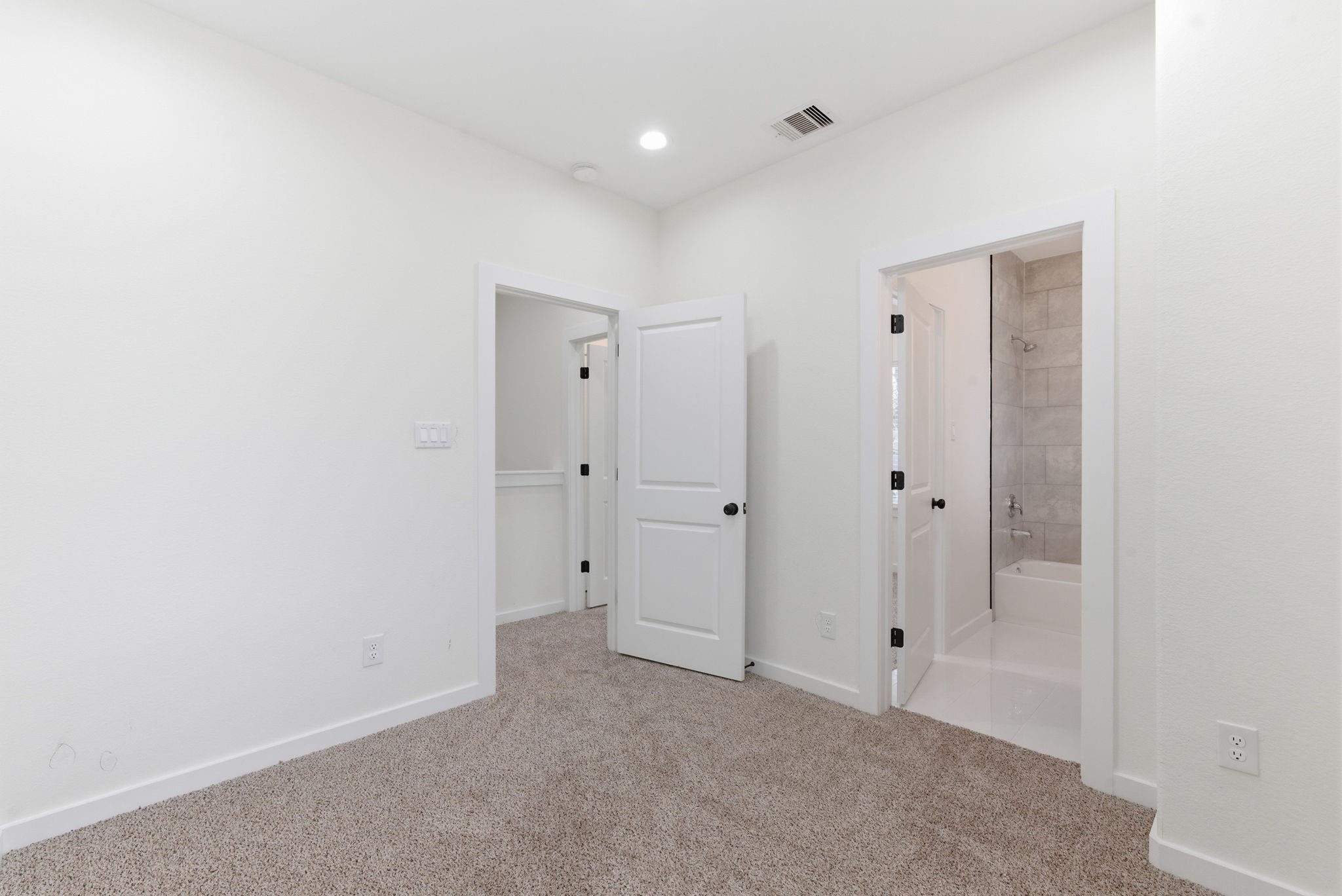 secondary bedroom upstairs connected to bathroom